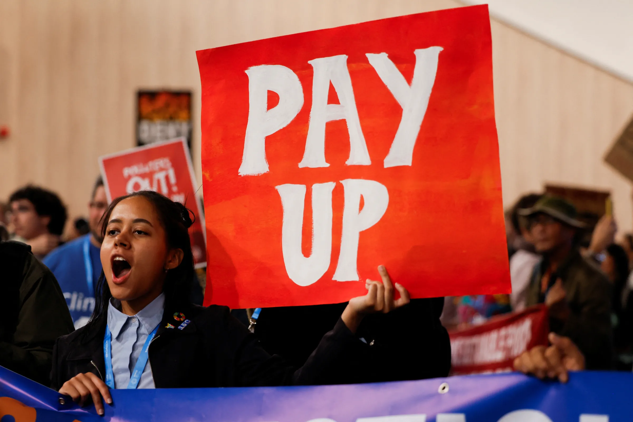An environmental activist takes part in a protest to urge world leaders to commit to a strong climate finance deal during the United Nations Climate Change Conference (COP29), in Baku, Azerbaijan November 16, 2024. REUTERS/Maxim Shemetov