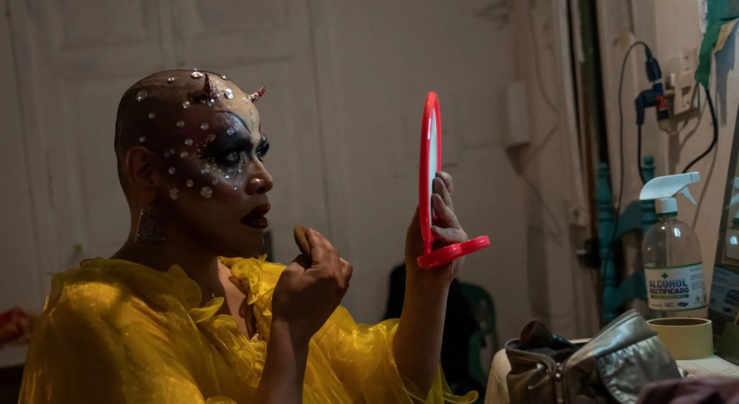 Paraguayan drag mother Envidia Metenes gets ready backstage in Asunción, Paraguay, February 22, 2023