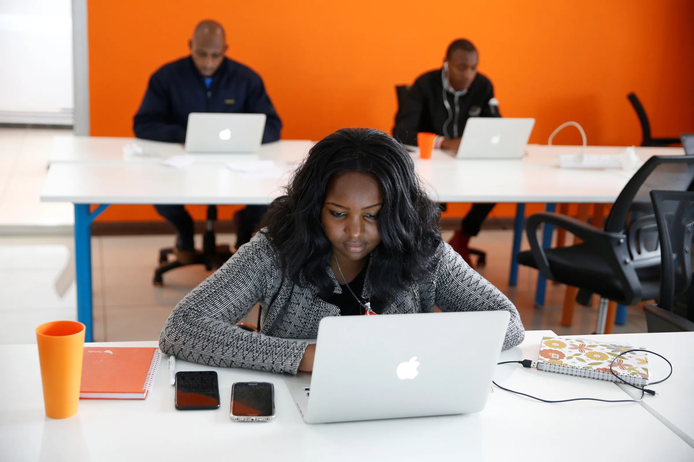 An tech start-up employee works on her computer at their office in Nairobi, Kenya, October 30, 2018. REUTERS/Baz Ratner