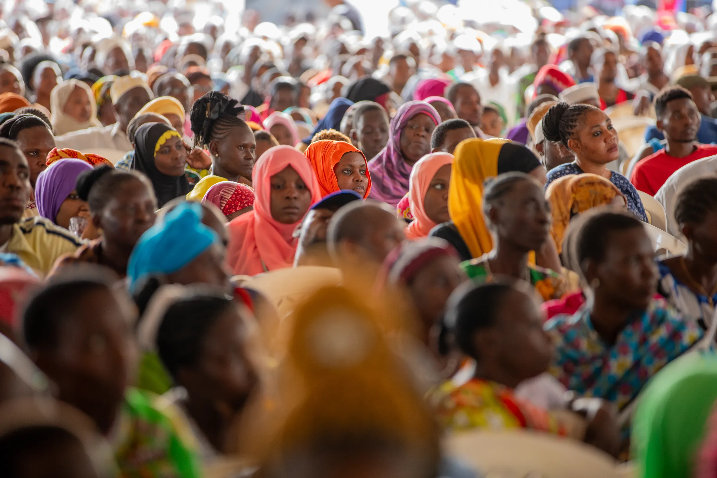 Hundreds of people from the stateless Pemba community attend an event in Kilifi, Kenya on 28 July, 2023 to register for citizenship. UNHCR/Handout via Thomson Reuters Foundation