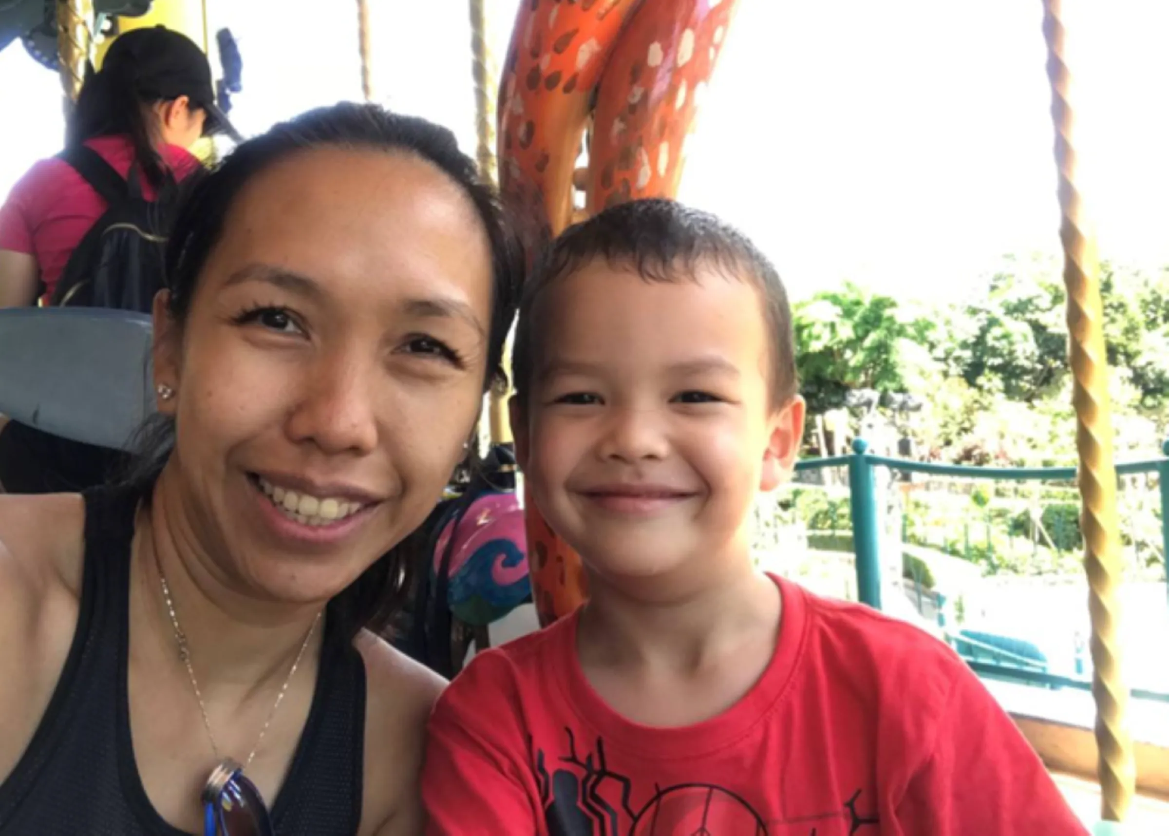 Former Malaysian squash champion Choong Wai Li cannot pass her nationality to her son Michael. The pair are pictured in Hong Kong in 2019. Choong Wai Li/Handout via Thomson Reuters Foundation