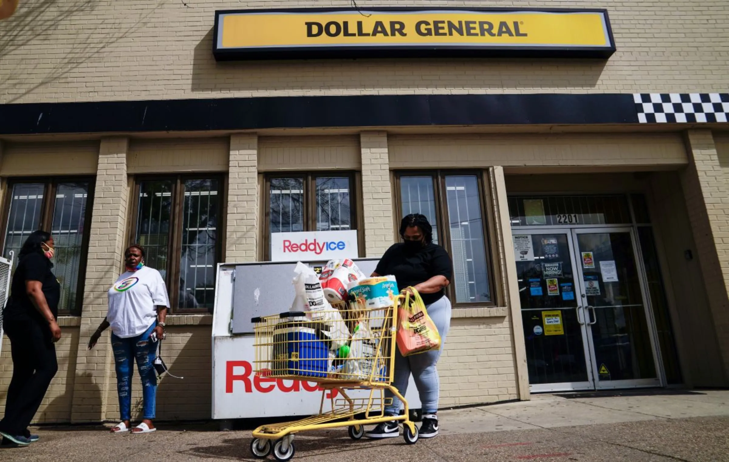 A person exits a Dollar General store in Mount Rainier, Maryland, U.S., June 1, 2021. REUTERS/Erin Scott