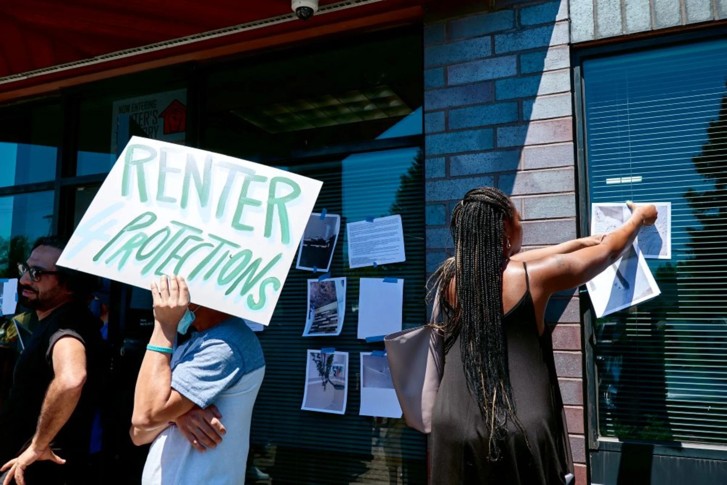 Tenants protest outside the office of a corporate landlord in New Brighton, Minnesota, on June 17, 2022