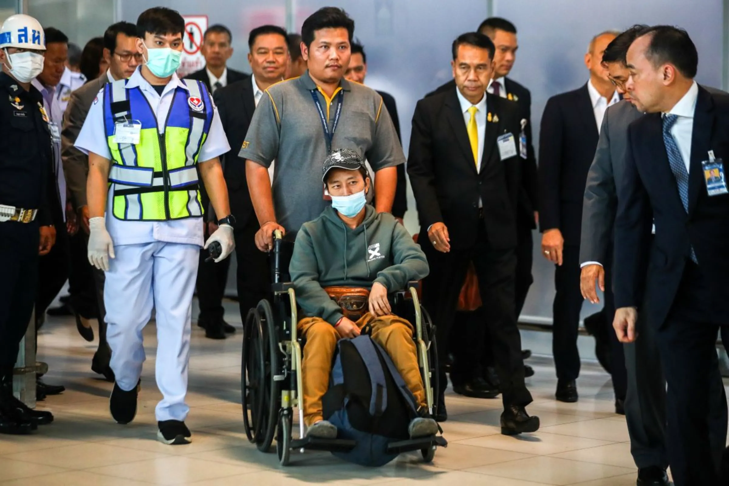 A migrant agricultural worker who was injured by a surprise attack on Israel by the Palestinian militant group Hamas, arrives at Bangkok's Suvarnabhumi Airport, Thailand, October 12, 2023. REUTERS/Chalinee Thirasupa