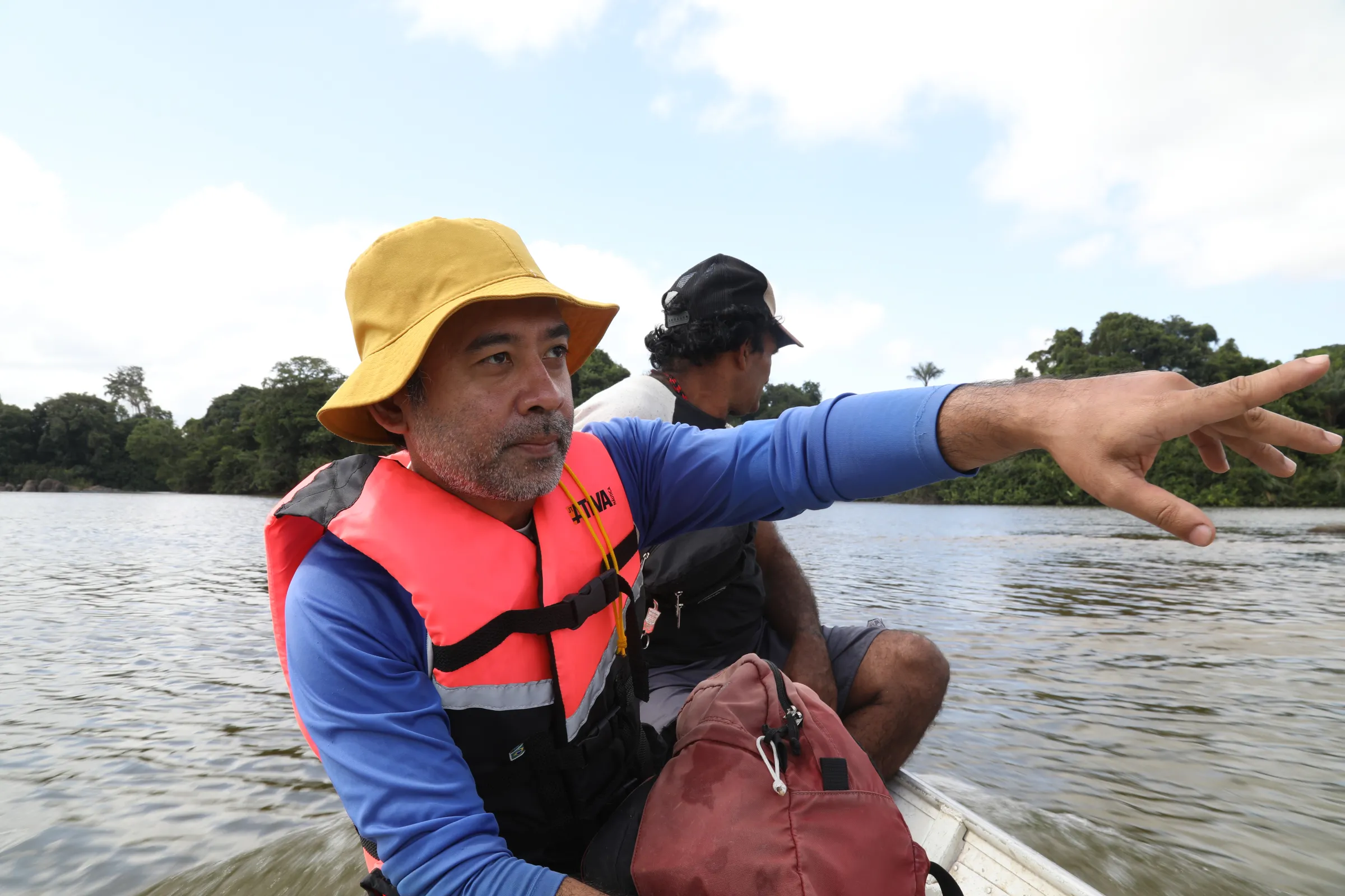 André Oliveira Sawakuchi, an associate professor at the Institute of Geosciences at the University of São Paulo, poses by the Xingu River, in Pará, Brazil, September 16, 2022. Thomson Reuters Foundation/Dan Collyns