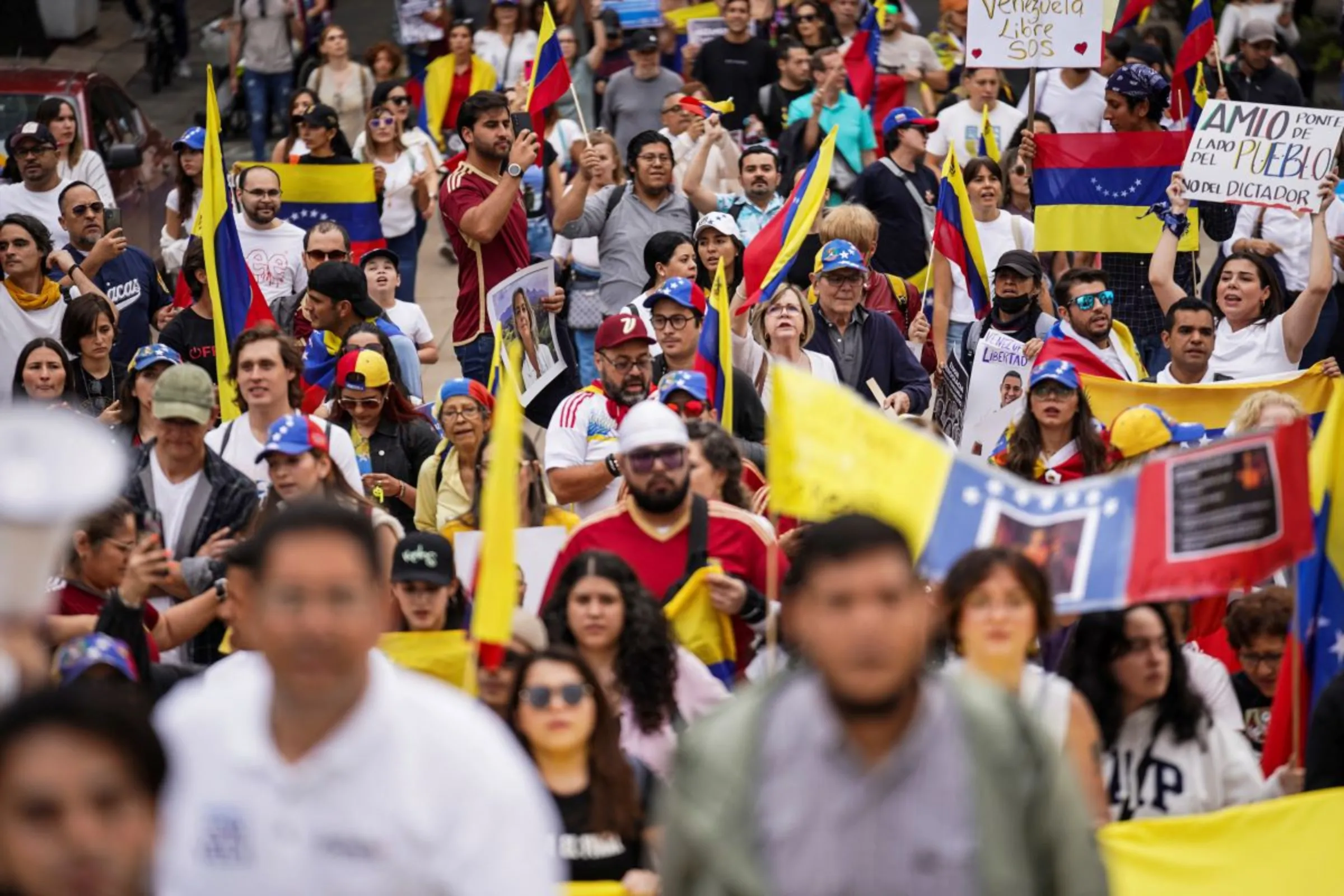 People march to protest against election results that awarded Venezuela's President Nicolas Maduro a third term, in Mexico City, Mexico August 10, 2024. REUTERS/Toya Sarno Jordan