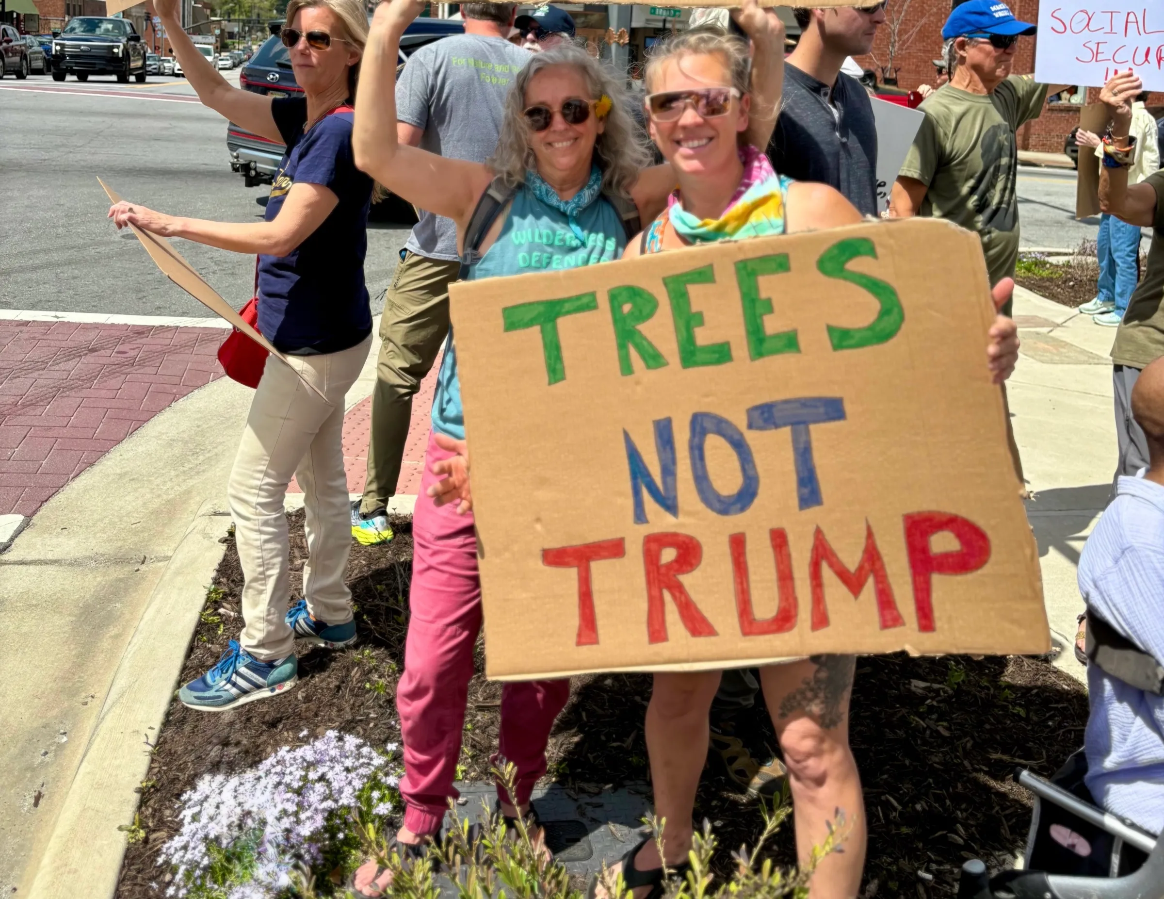 People take part in a protest in Brevard, North Carolina, on April 5. Sara Millar/Handout via Thomson Reuters Foundation
