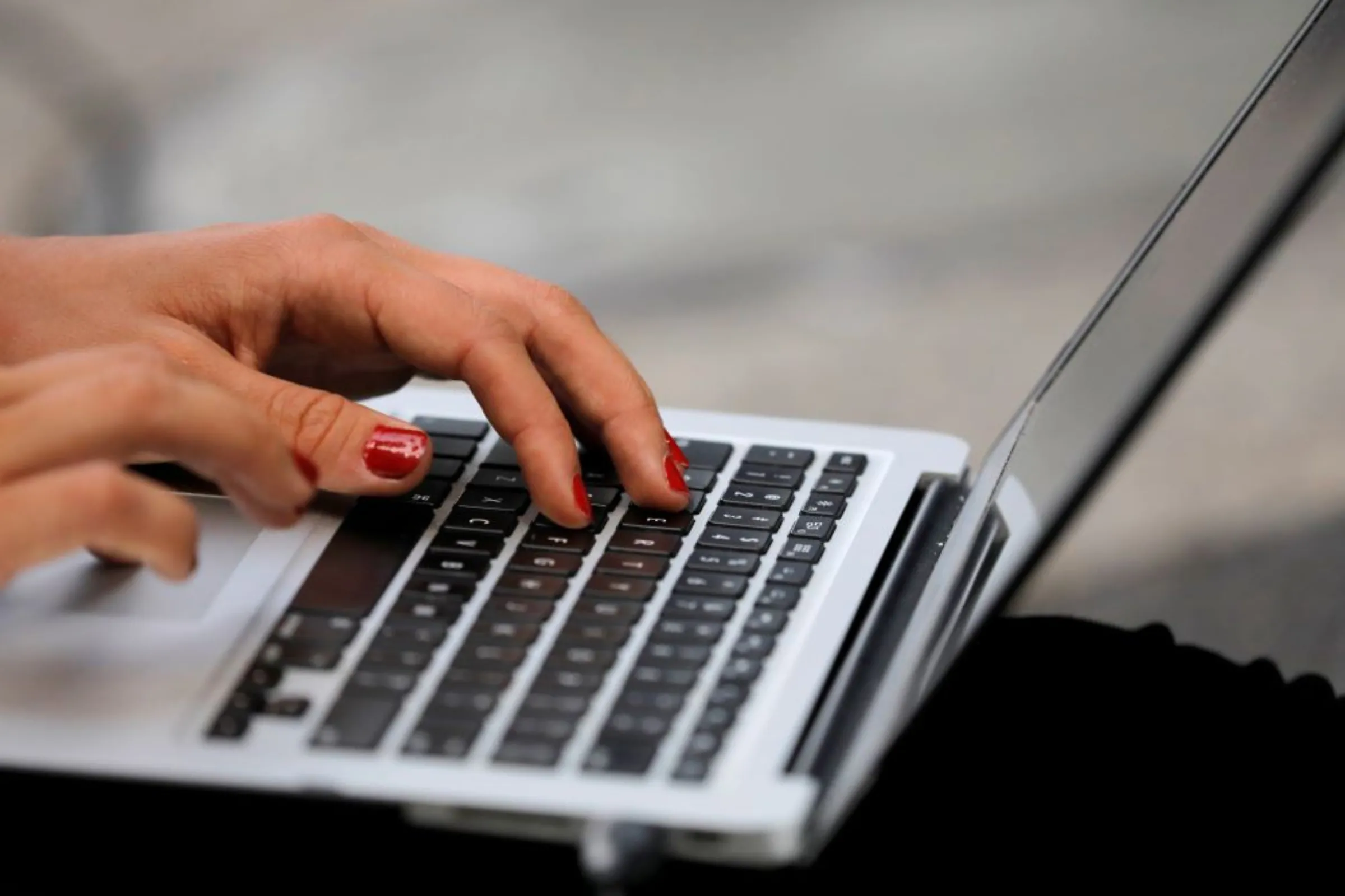 A person types on a laptop computer in Manhattan, New York City, U.S., September 11, 2020