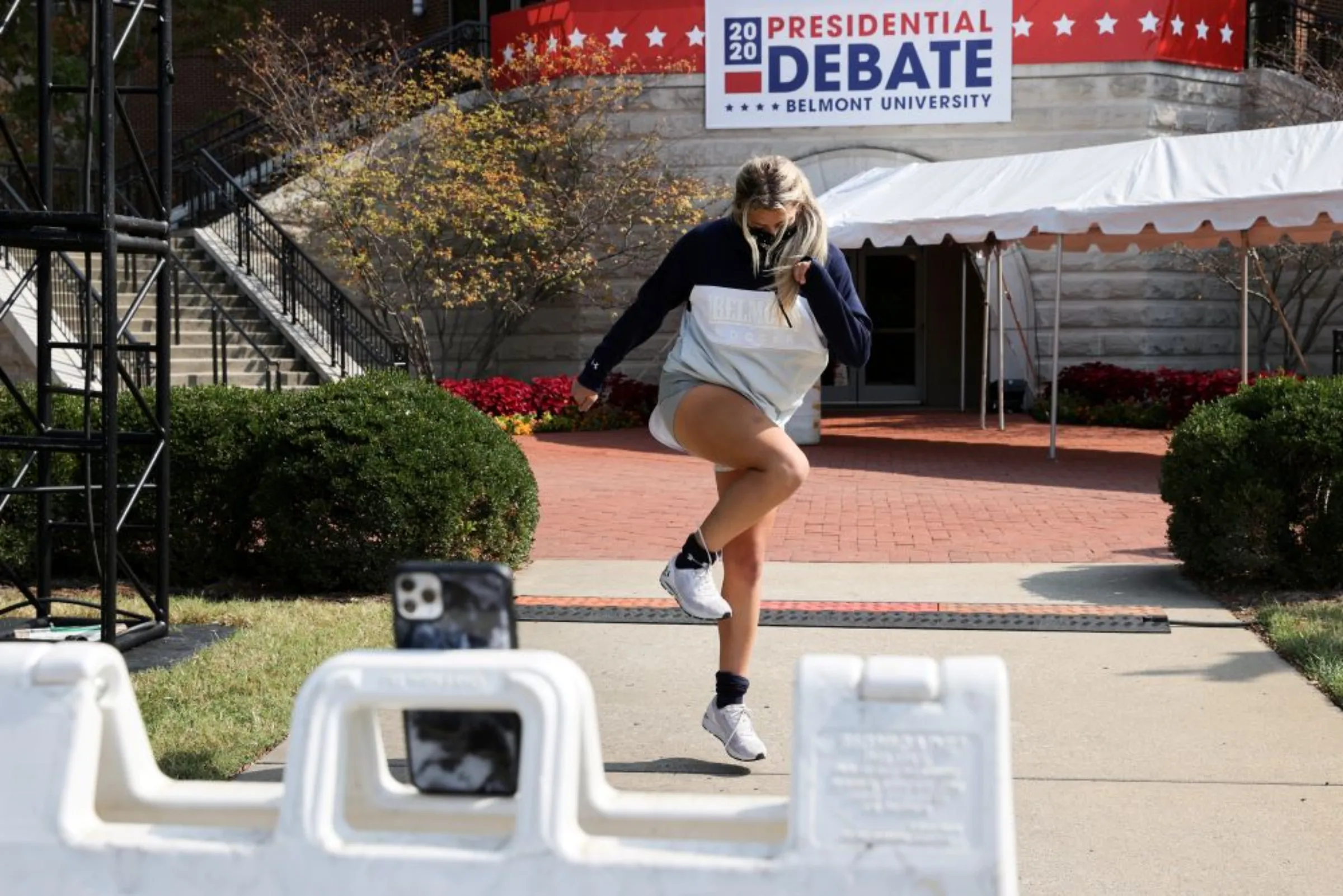 Belmont University student records a TikTok video of herself dancing outside at Belmont University in Nashville, Tennessee, U.S. October 20, 2020