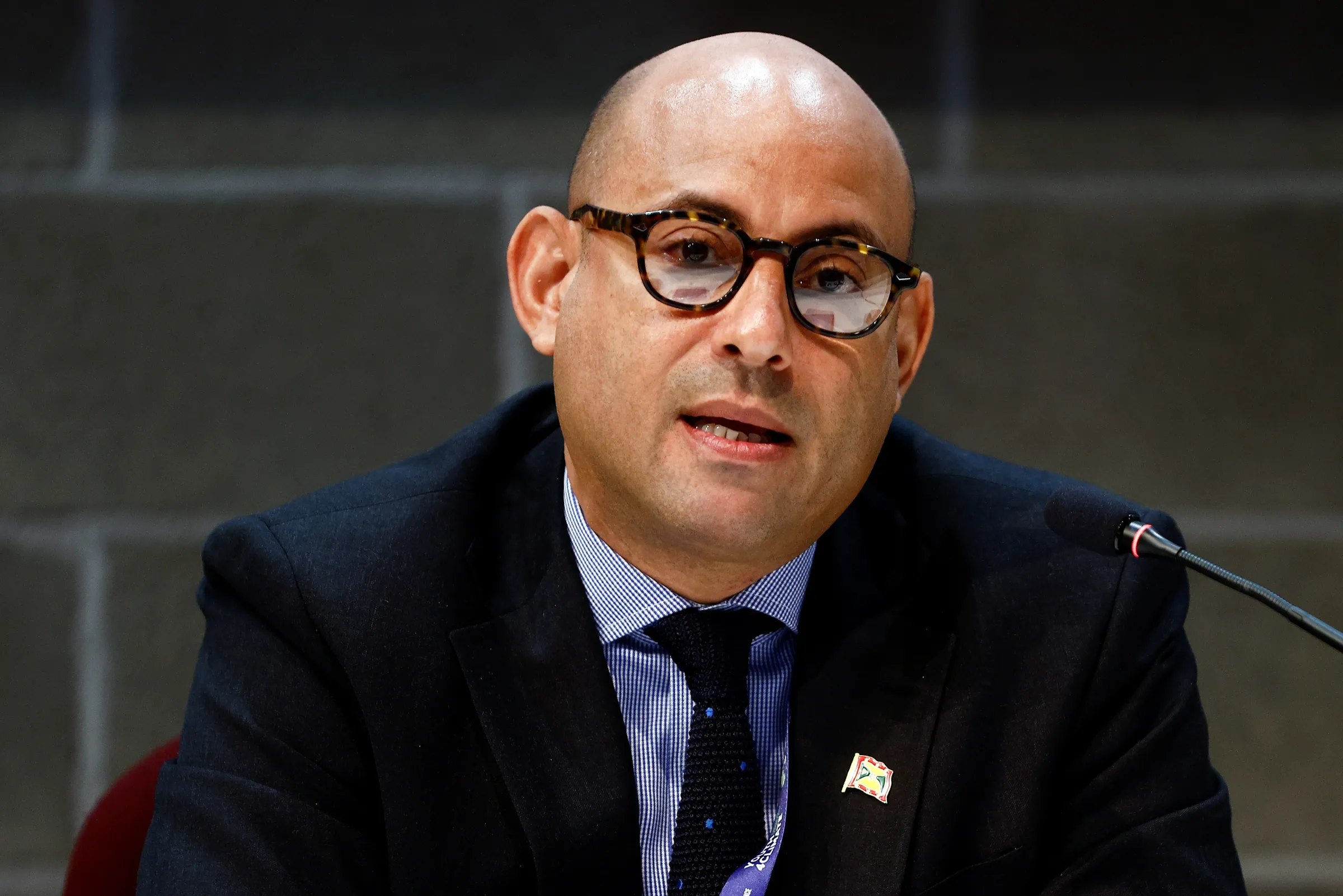 Grenada's Minister for Climate Resilience Simon Stiell speaks at a news conference during the pre-COP26 climate meeting in Milan, Italy October 2, 2021