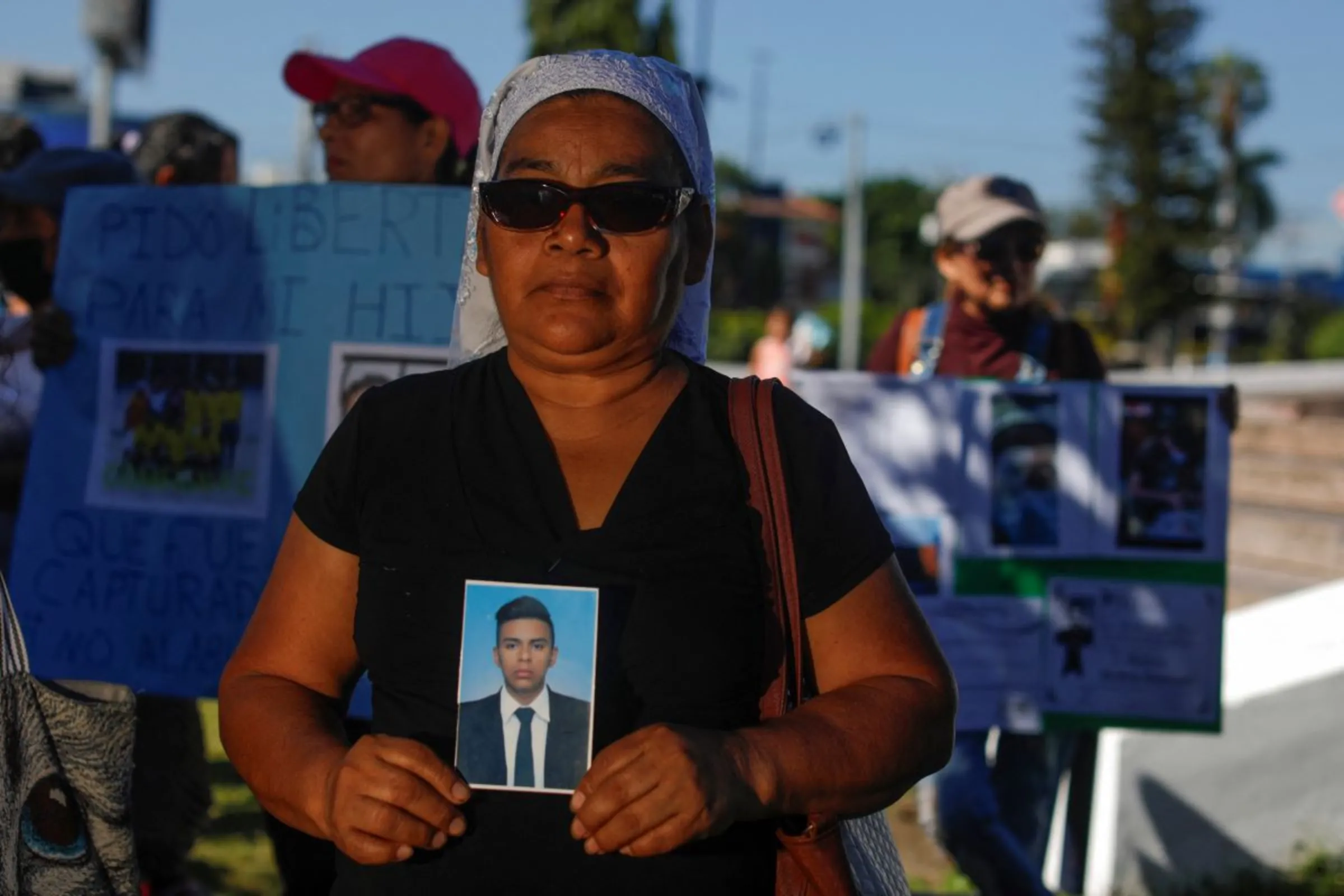 Activists and families participate in a protest to demand the release of relatives detained during the government's state of emergency to curb gang violence, in San Salvador, El Salvador August 16, 2023. REUTERS/Jose Cabezas