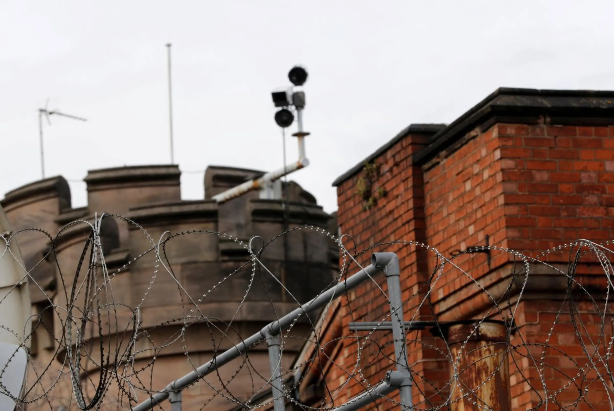 Razor wire is seen on the walls outside Leicester Prison, Britain September 14, 2018. REUTERS/Darren Staples