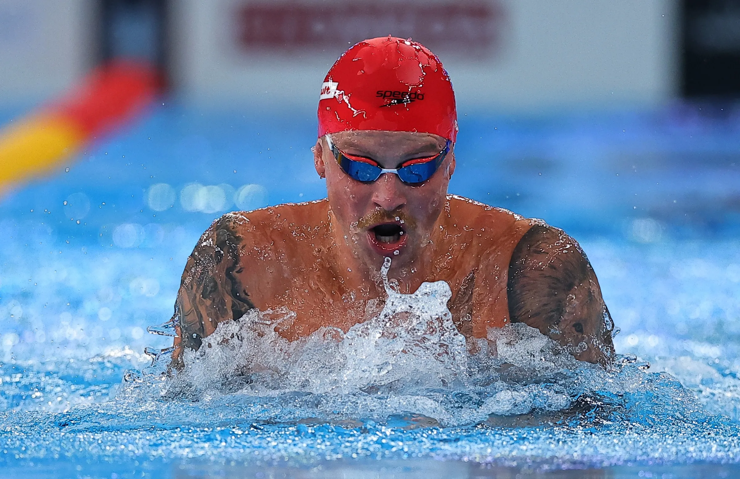 Britain's Adam Peaty - coached by Melanie Marshall - competes at the World Aquatics Championships in Doha, Qatar, February 2024 REUTERS/Evgenia Novozhenina