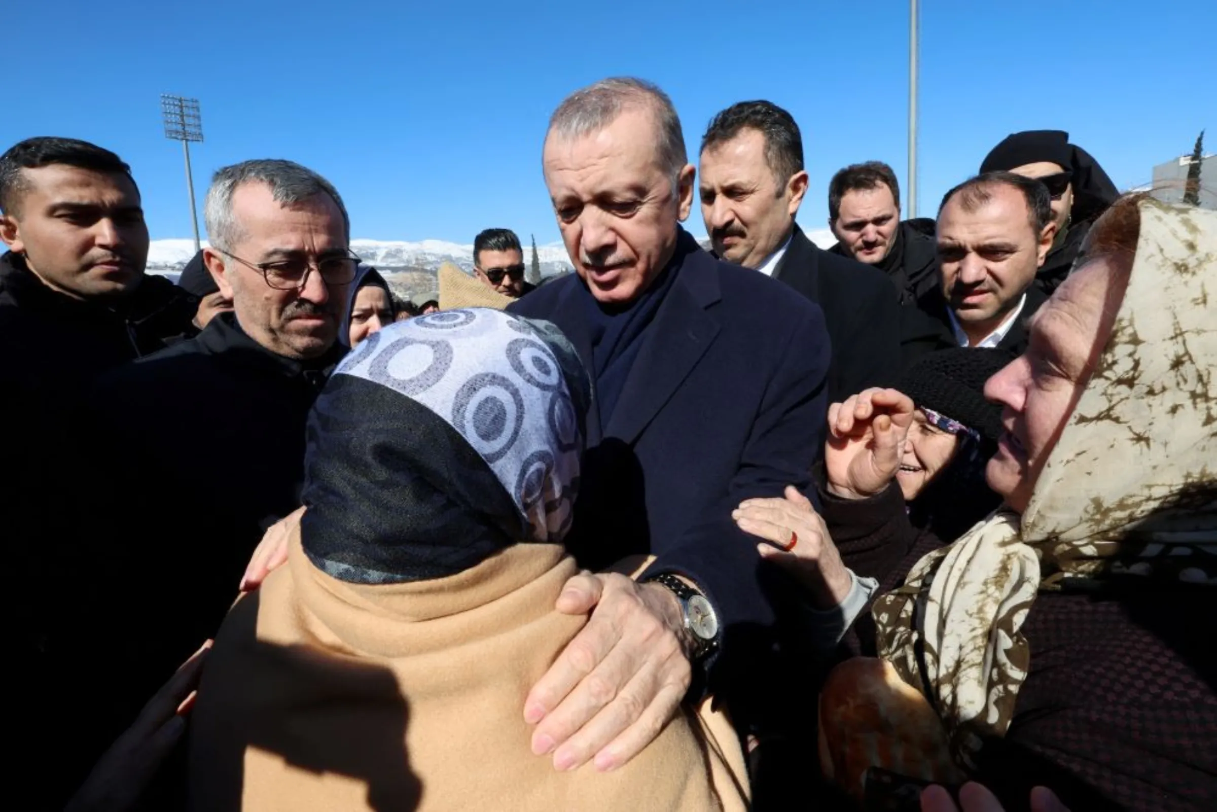 Turkish President Tayyip Erdogan meets with people in the aftermath of a deadly earthquake in Kahramanmaras, Turkey February 8, 2023