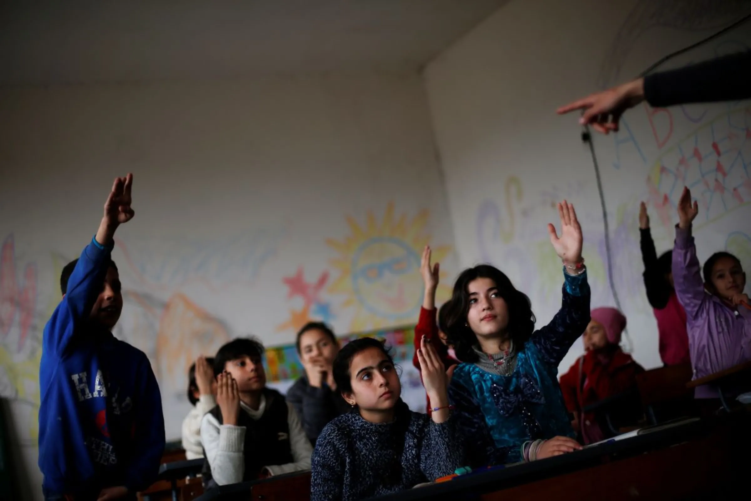 Children attend a math class in Harmanli, southeast of Sofia, Bulgaria January 21, 2014. REUTERS/Stoyan Nenov