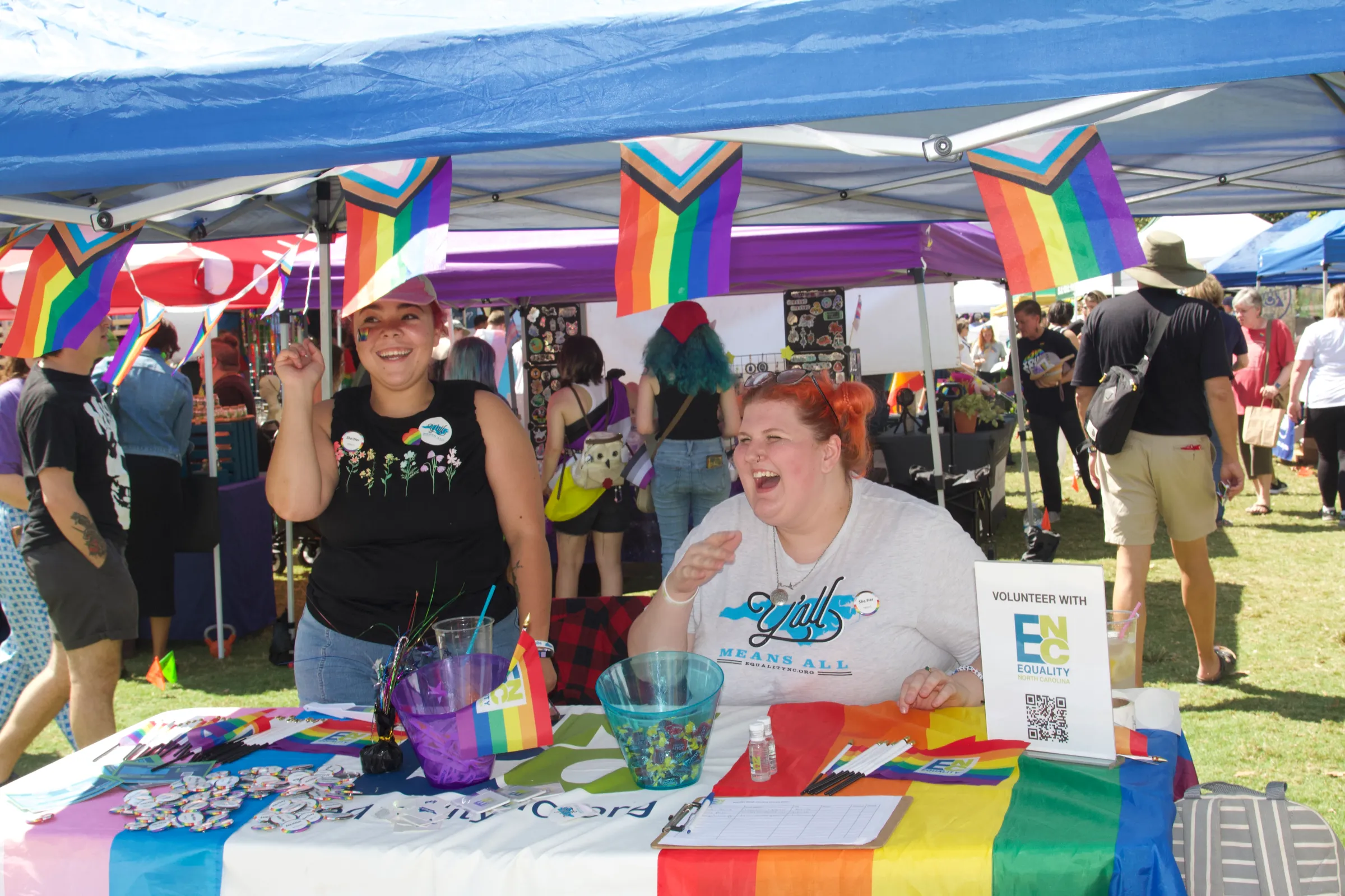 Advocates offer voting-related information at a Pride festival in Ashville, North Carolina, in September. Iliana Hernandez/Atrévete LLC/Handout via Thomson Reuters Foundation