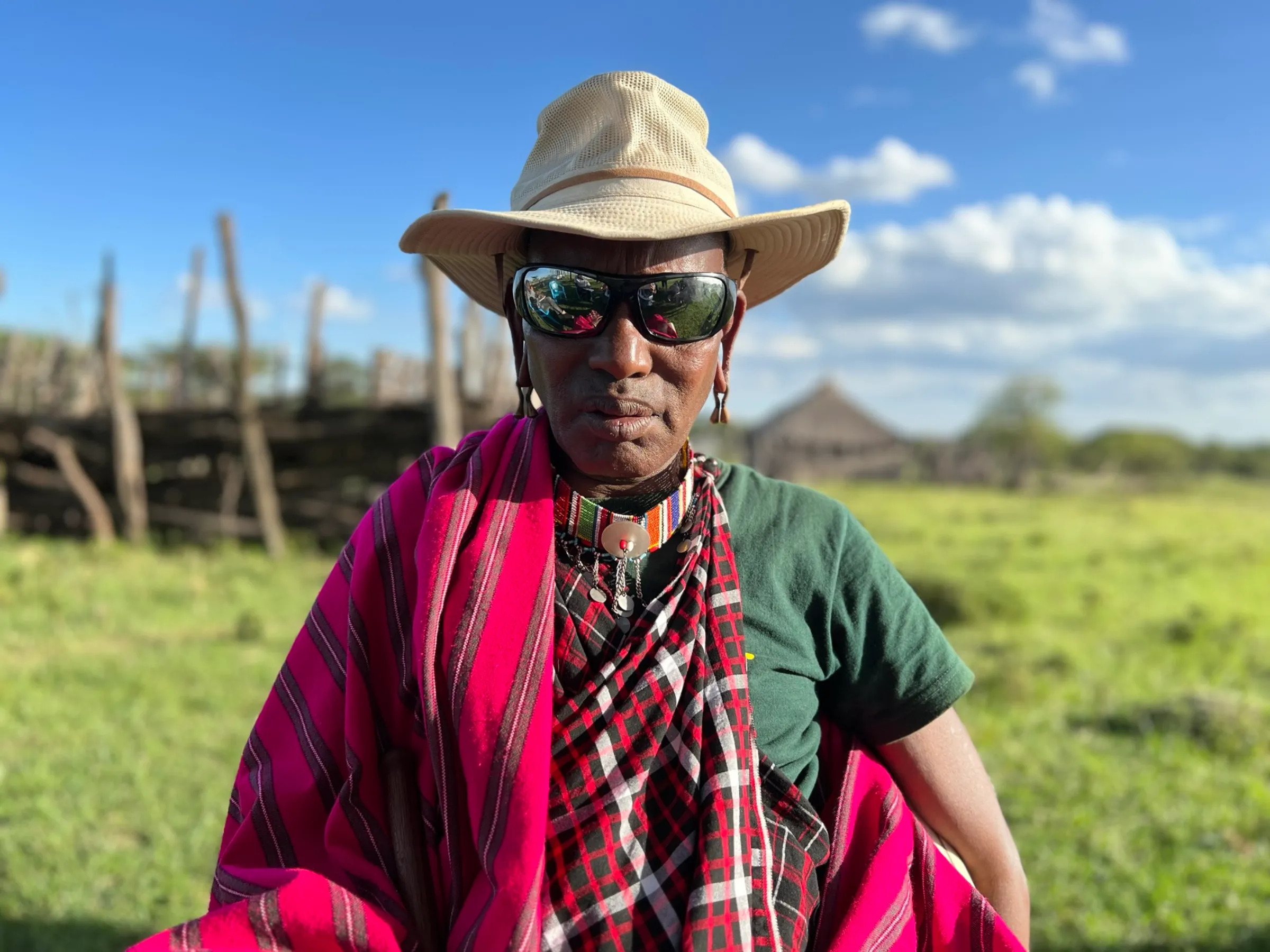 Maasai elder Ngararika Noompunito poses for a picture in Oloisukut Conservancy, bordering the Maasai Mara National Reserve, in Kenya on Sept 27 2022. THOMSON REUTERS FOUNDATION/Nita Bhalla