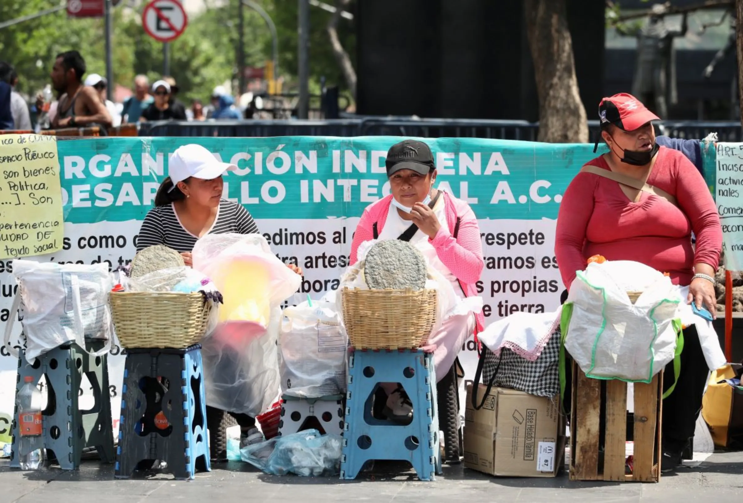 Street traders in Mexico City on April 28, 2023. Despite the tax cuts, low-income women still struggle to afford pads as inflation rises