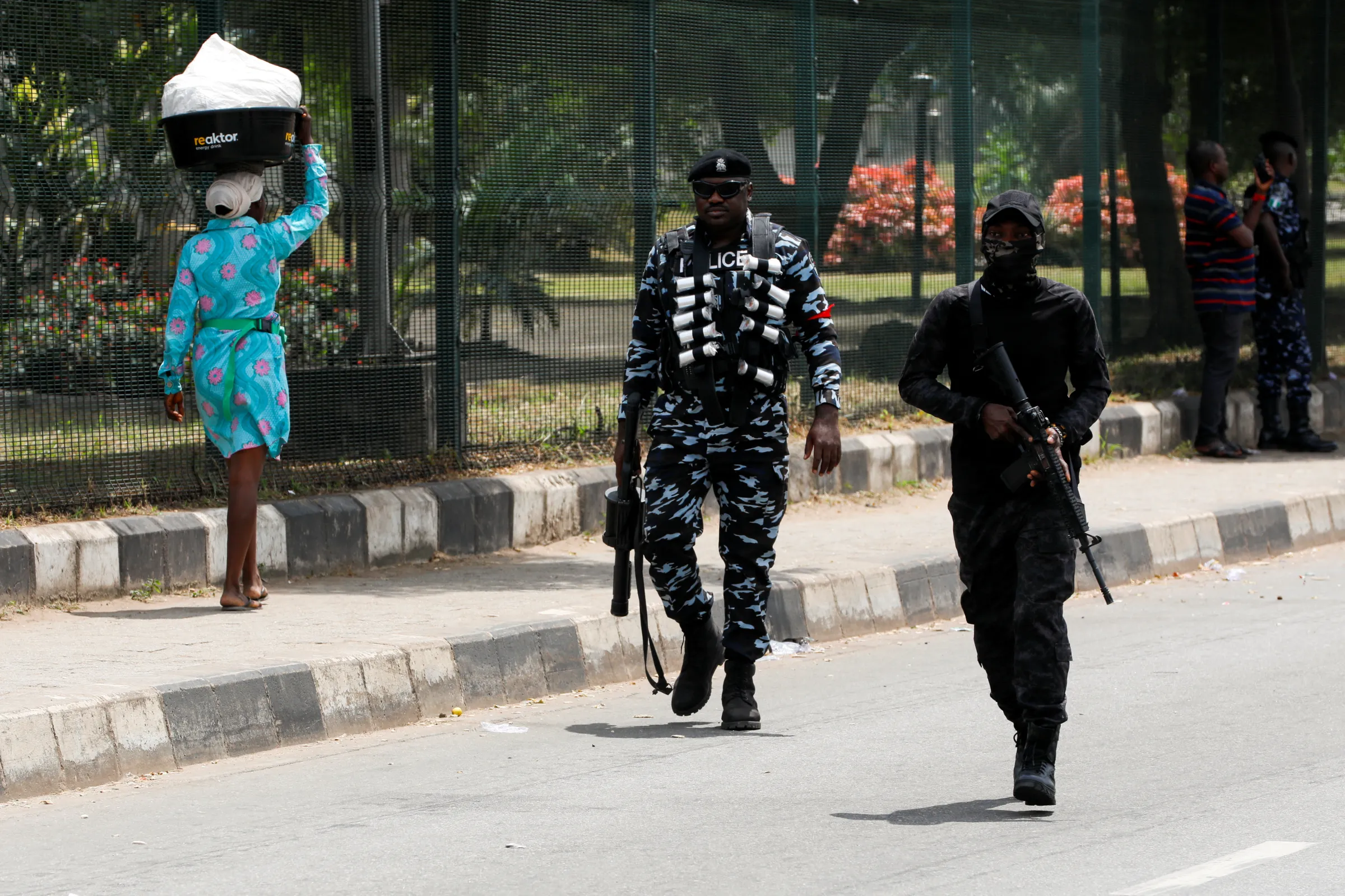 Nigerian police personnel patrol the streets, amid ongoing anti-government demonstrations against bad governance and economic hardship, in Lagos, Nigeria August 4, 2024. REUTERS/Francis Kokoroko