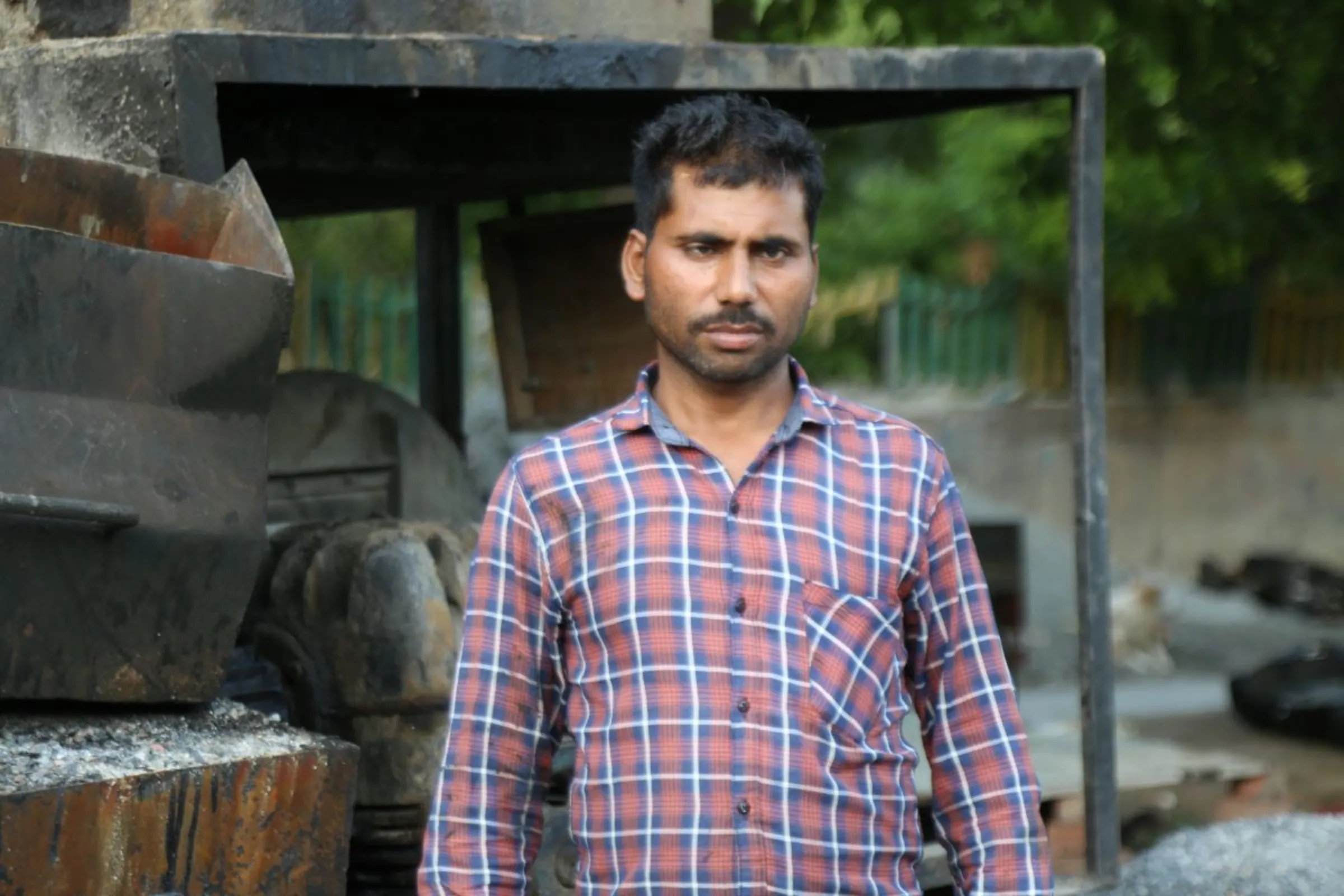 Shafiq Ansari, a road building labourer, will not go back to his home state of Jharkhand to vote in May over fears of losing wages, Noida, India, April 24, 2024. Thomson Reuters Foundation/Annie Banerji