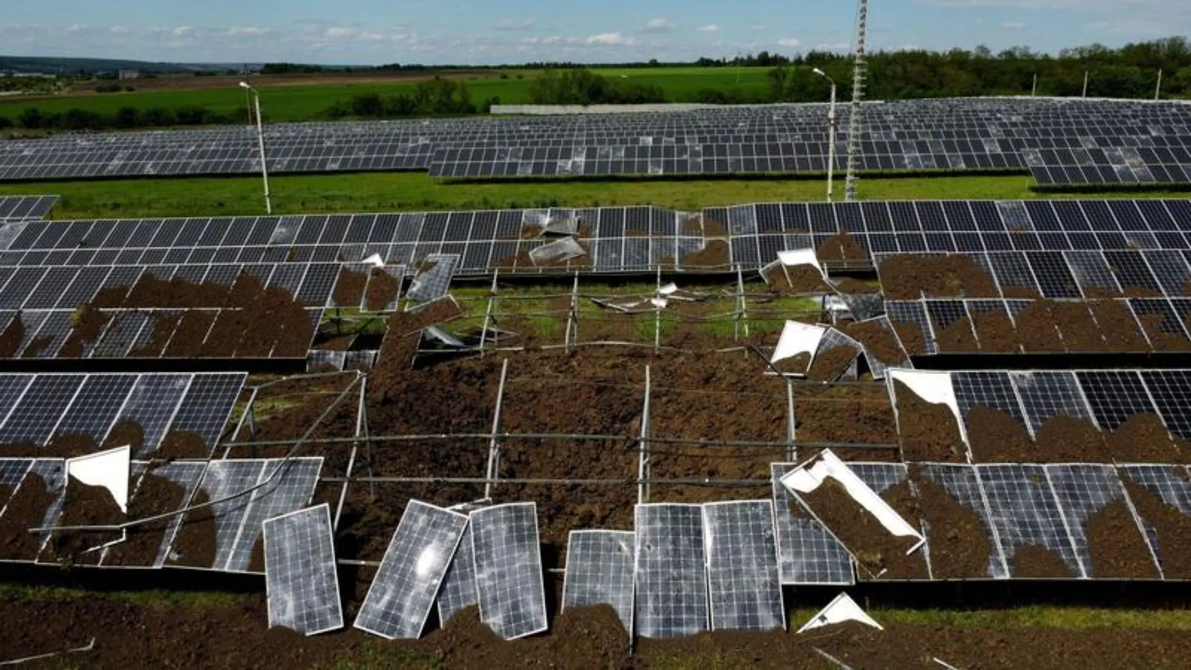 Solar panels damaged in shelling are seen at a power station that was producing 2.5 megawatts of power, amid Russia's attack on Ukraine, in the town of Merefa on the outskirts of Kharkiv, Ukraine May 28, 2022. Picture taken with a drone. REUTERS/Ivan Alvarado
