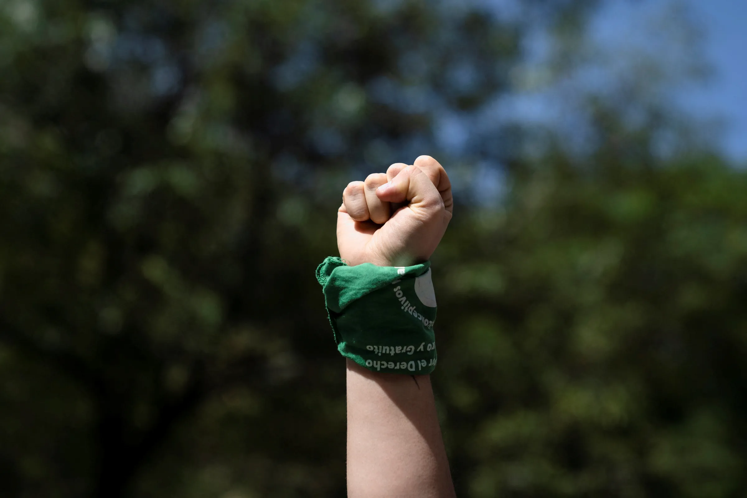 A woman raises her first during a protest in support of abortion rights