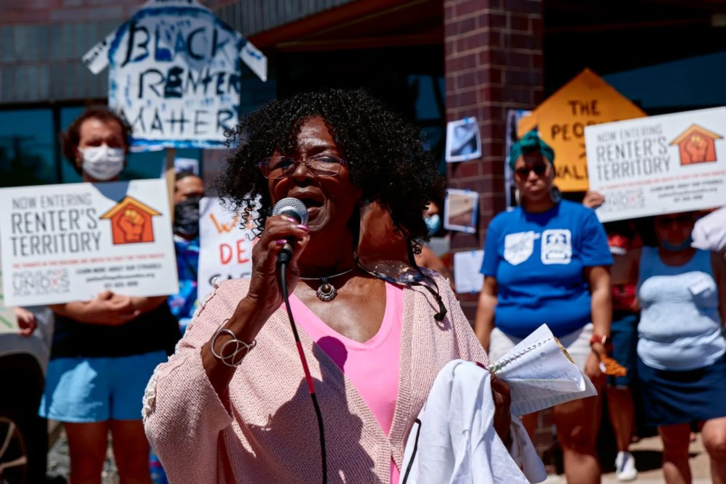 Tenants protest outside the office of a corporate landlord in New Brighton, Minnesota, on June 17, 2022