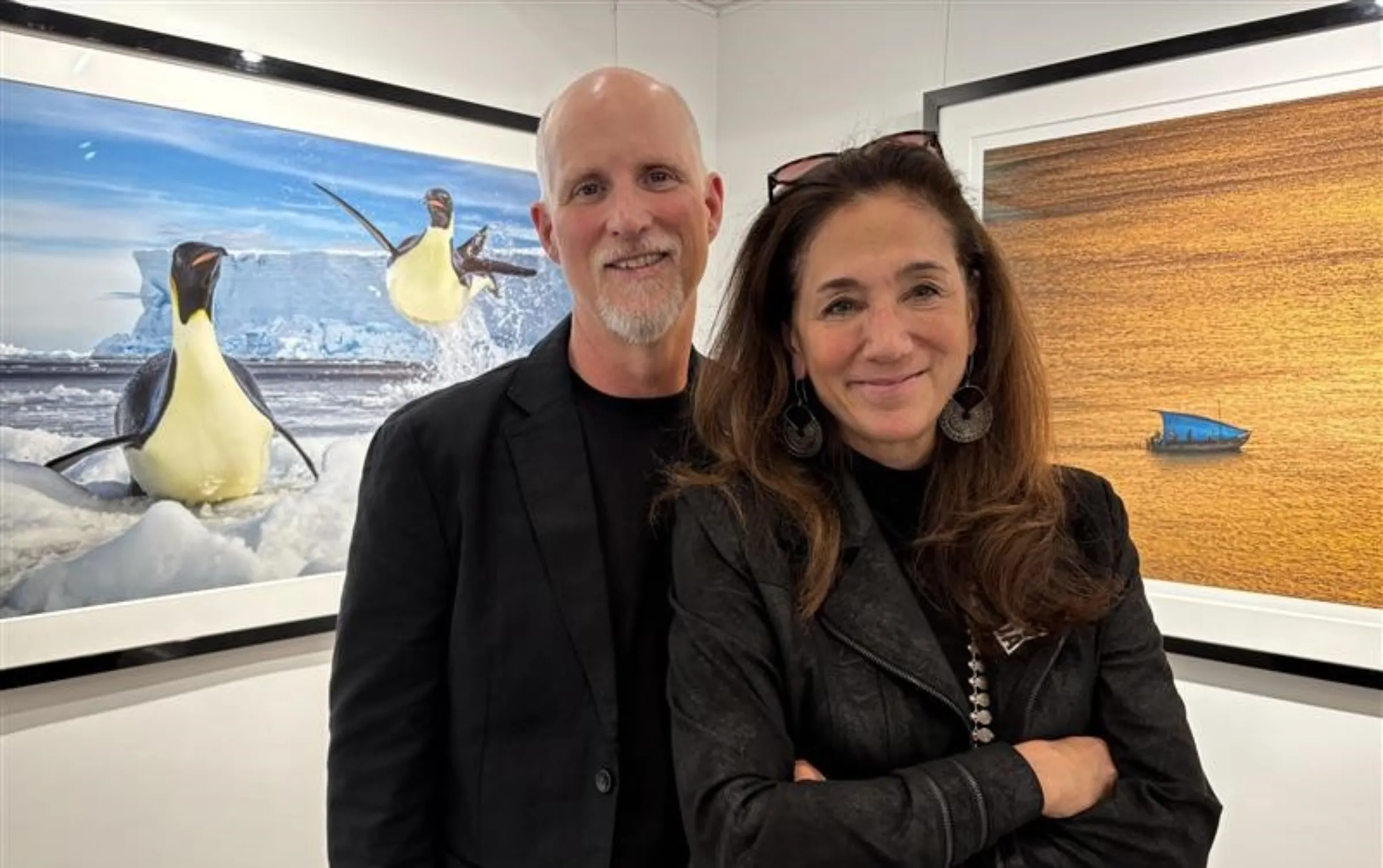 Wildlife photographers and conservationists Paul Nicklen and Cristina Mittermeier at the C. Parker Gallery in New York, United States. September 22, 2025. Thomson Reuters Foundation/Jack Graham