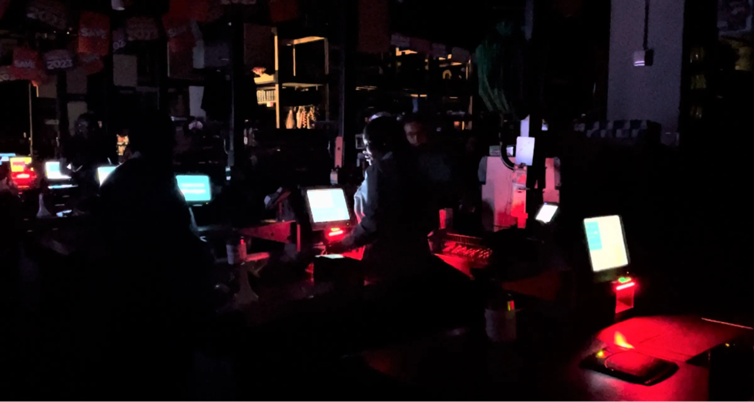 A supermarket in Johannesburg is plunged into darkness during one of the numerous power cuts rolled out as the country’s electricity grid collapses in South Africa, January 14, 2023. Thomson Reuters Foundation/Kim Harrisberg