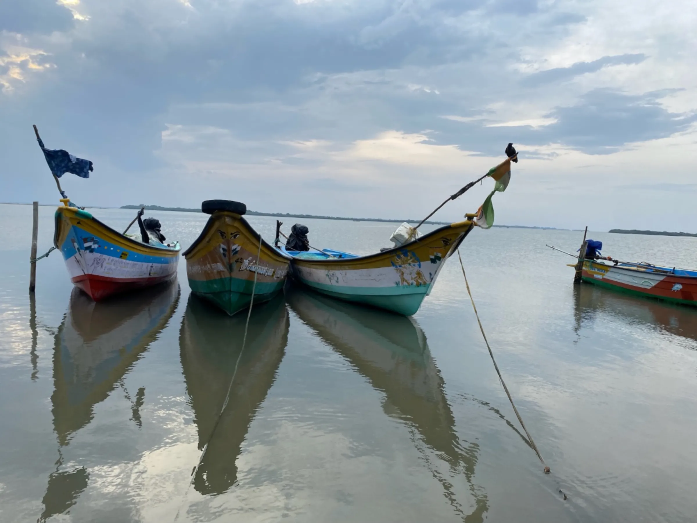 Fishing boats moored in Pulicat lake, in Gunankuppam, near Chennai, India, July 14, 2023