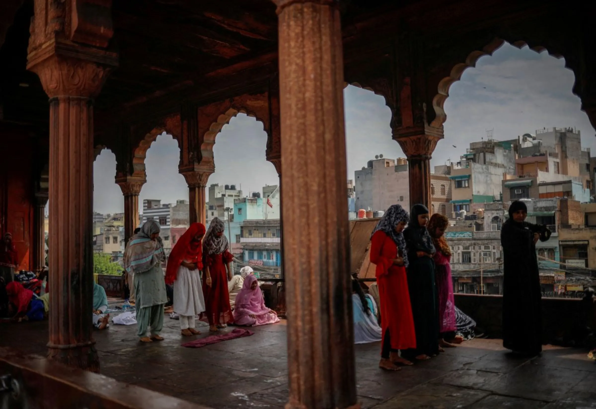 Muslim women pray during the first Friday of the holy month of Ramadan at Jama Masjid (Grand Mosque) in the old quarters of Delhi, India March 24