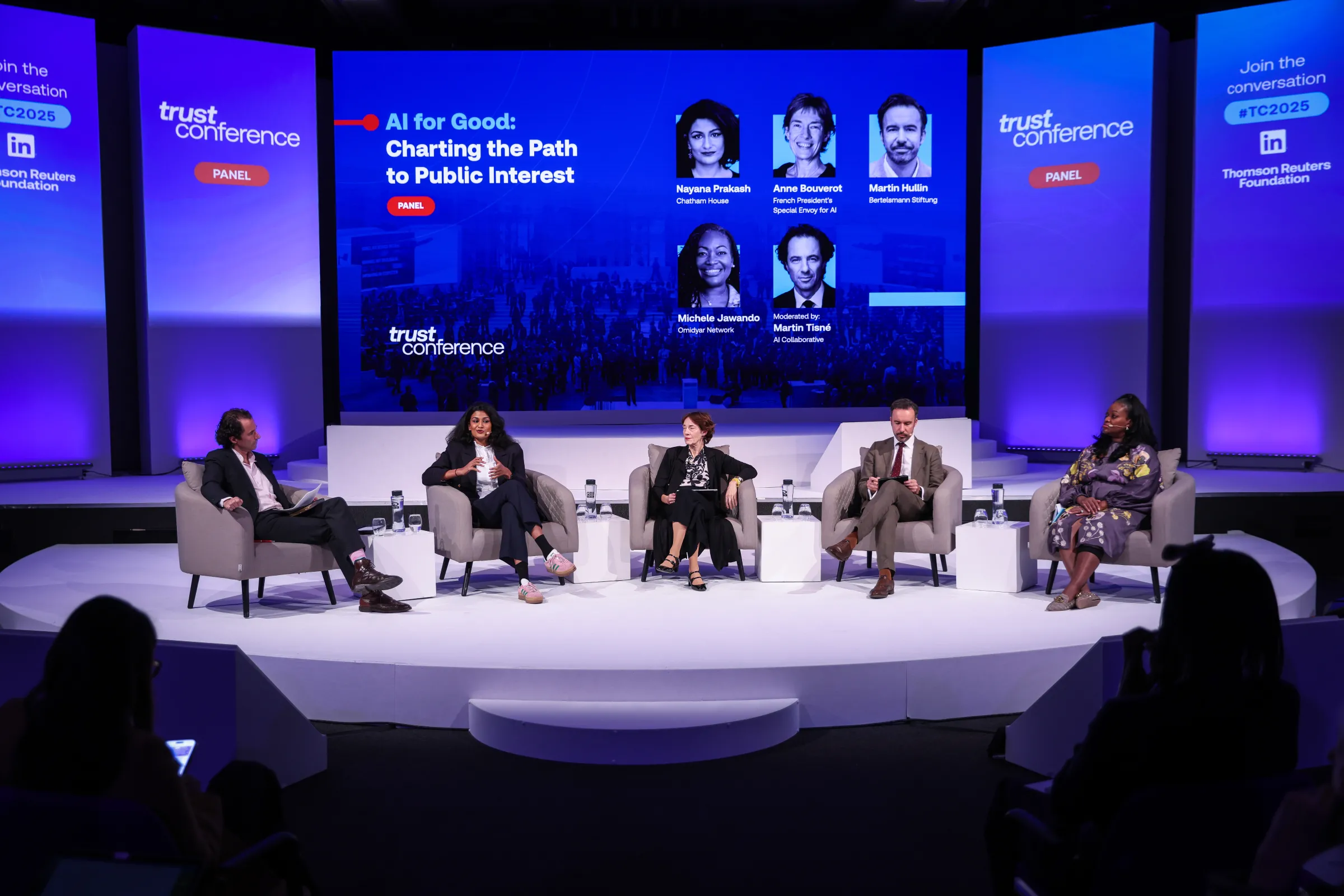 Anne Bouverot speaks alongside Nayana Prakash (CL), Martin Jullin (CR), Michele Jawando (R) on a panel moderated by Martin Tisne (L) on 'AI for Good: Charting the Path to Public Interest' at the Thomson Reuters Foundation annual Trust Conference in London, Britain, October 22, 2025. Thomson Reuters Foundation.