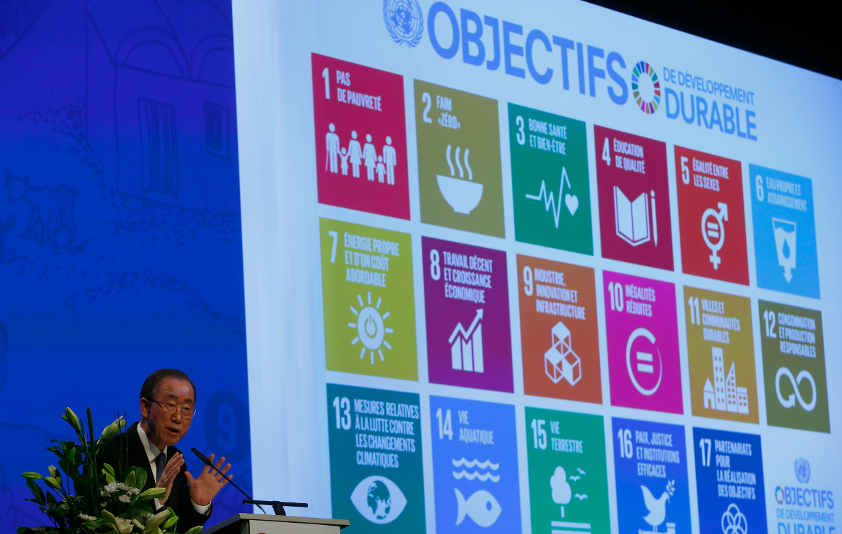 A screen displays the UN's 17 Sustainable Development Goals while the UN Secretary-General speaks into a microphone
