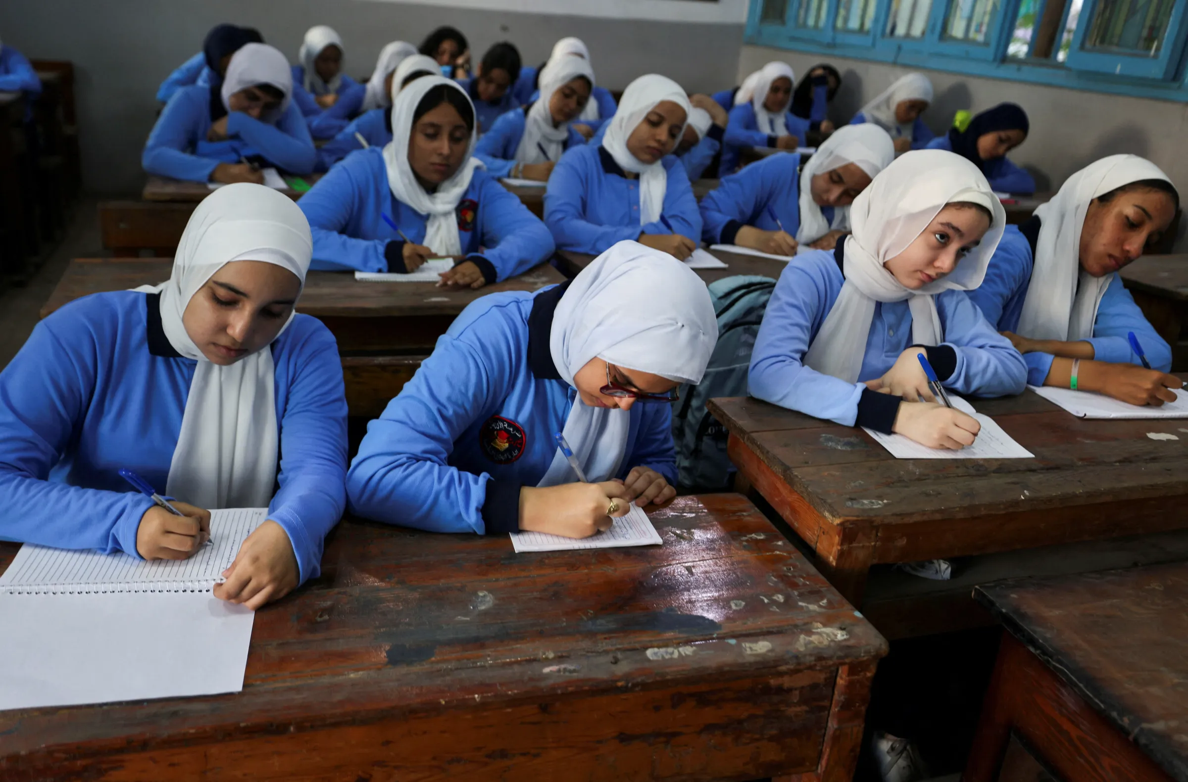 Students attend a class on the first day of the academic year at Orman school, in Cairo, Egypt, September 22, 2024. REUTERS/Mohamed Abd El Ghany