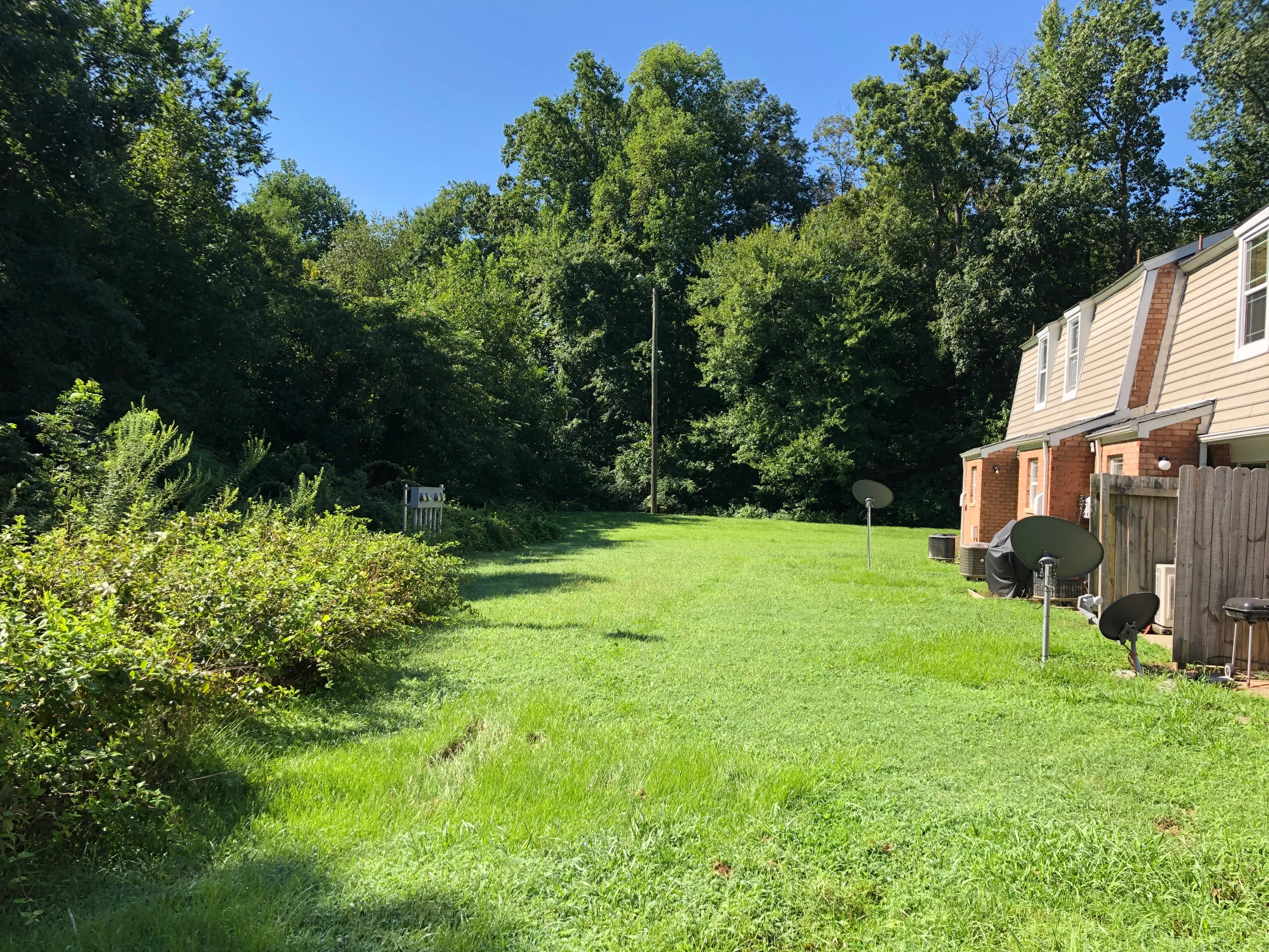 A neighborhood backs up against a 13-acre property in August 2020 that is now being converted into a public park in the Southside area of Richmond, Virginia. Parker C. Agelasto/Handout via Thomson Reuters Foundation