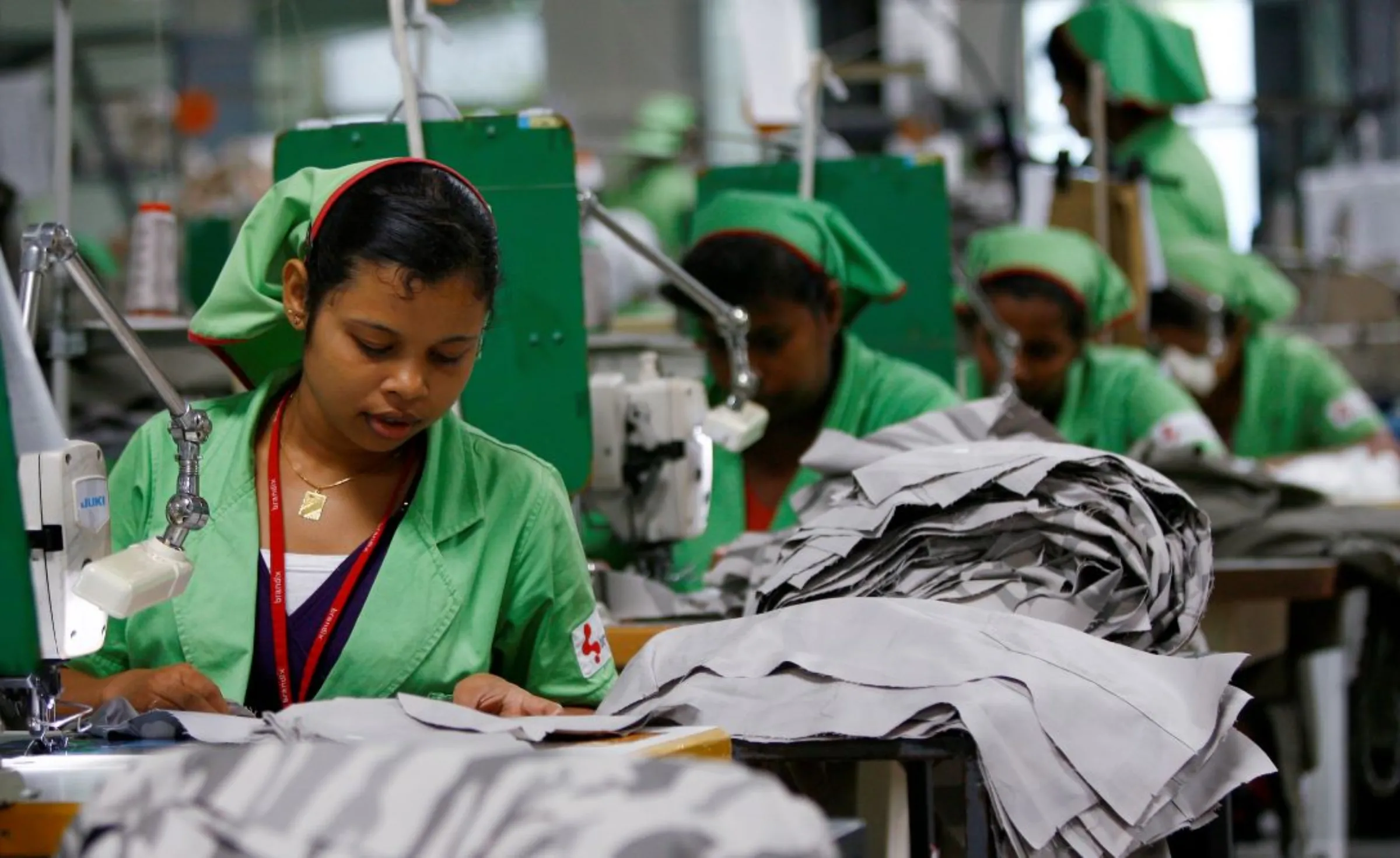 Garment workers sew pants in a Brandix factory, which exports many of the items to the European Union, in Colombo, Sri Lanka, October 1, 2009