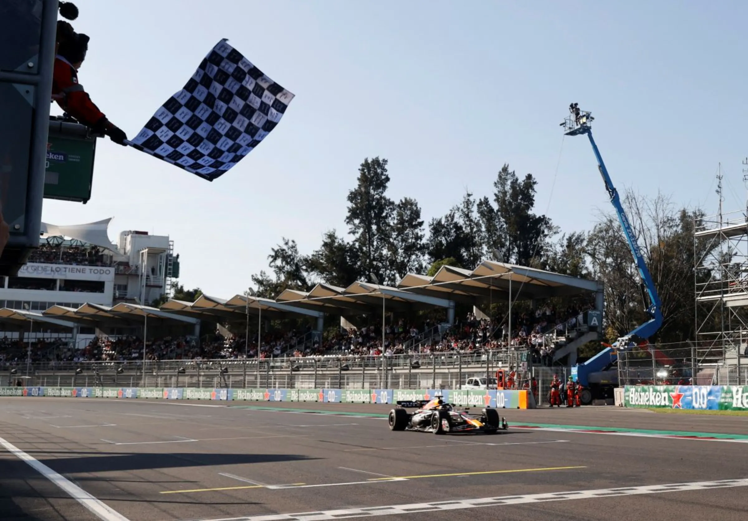 Formula One F1 - Mexico City Grand Prix - Autodromo Hermanos Rodriguez, Mexico City, Mexico - October 29, 2023 Red Bull's Max Verstappen passes the chequered flag to win the Mexico City Grand Prix