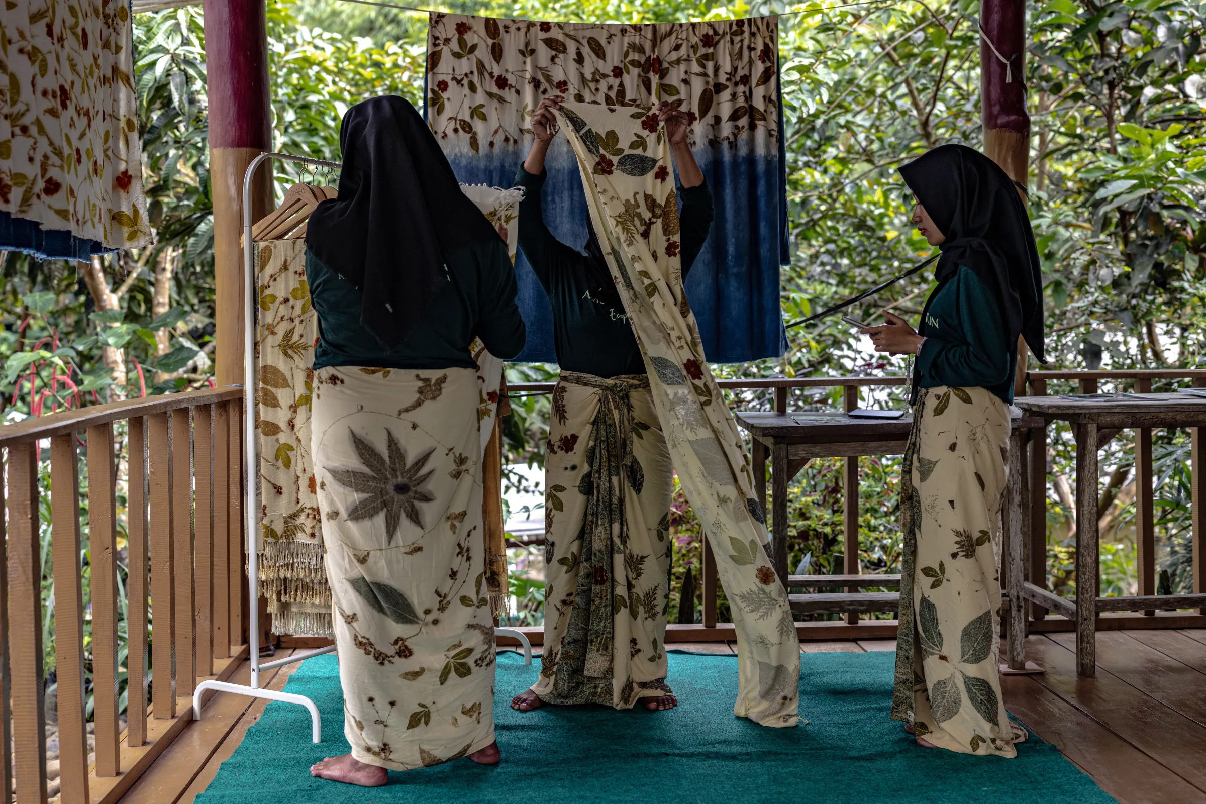 Ecoprint products created by the Ambu Halimun community are displayed on a simple setup in Citalahab Central, West Java, Indonesia, on July 16, 2025. Thomson Reuters Foundation/Yudha Baskoro