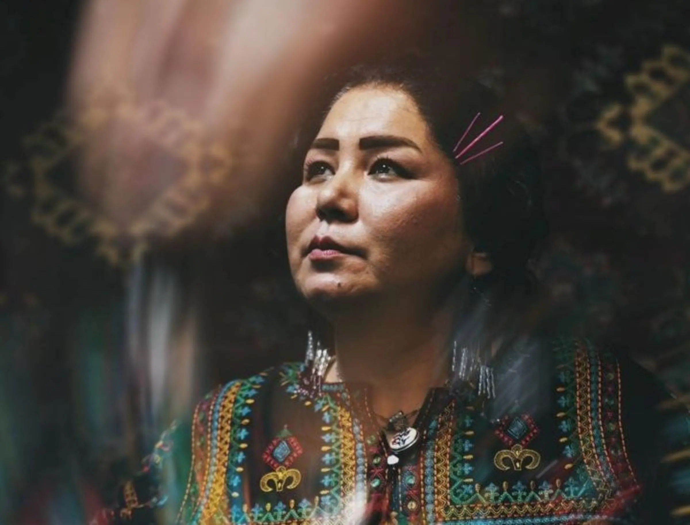 Afghan entrepreneur Laila Haidari wears clothing made at a handicraft centre she set up in Kabul. Photo taken August 2023. Handout/Thomson Reuters Foundation