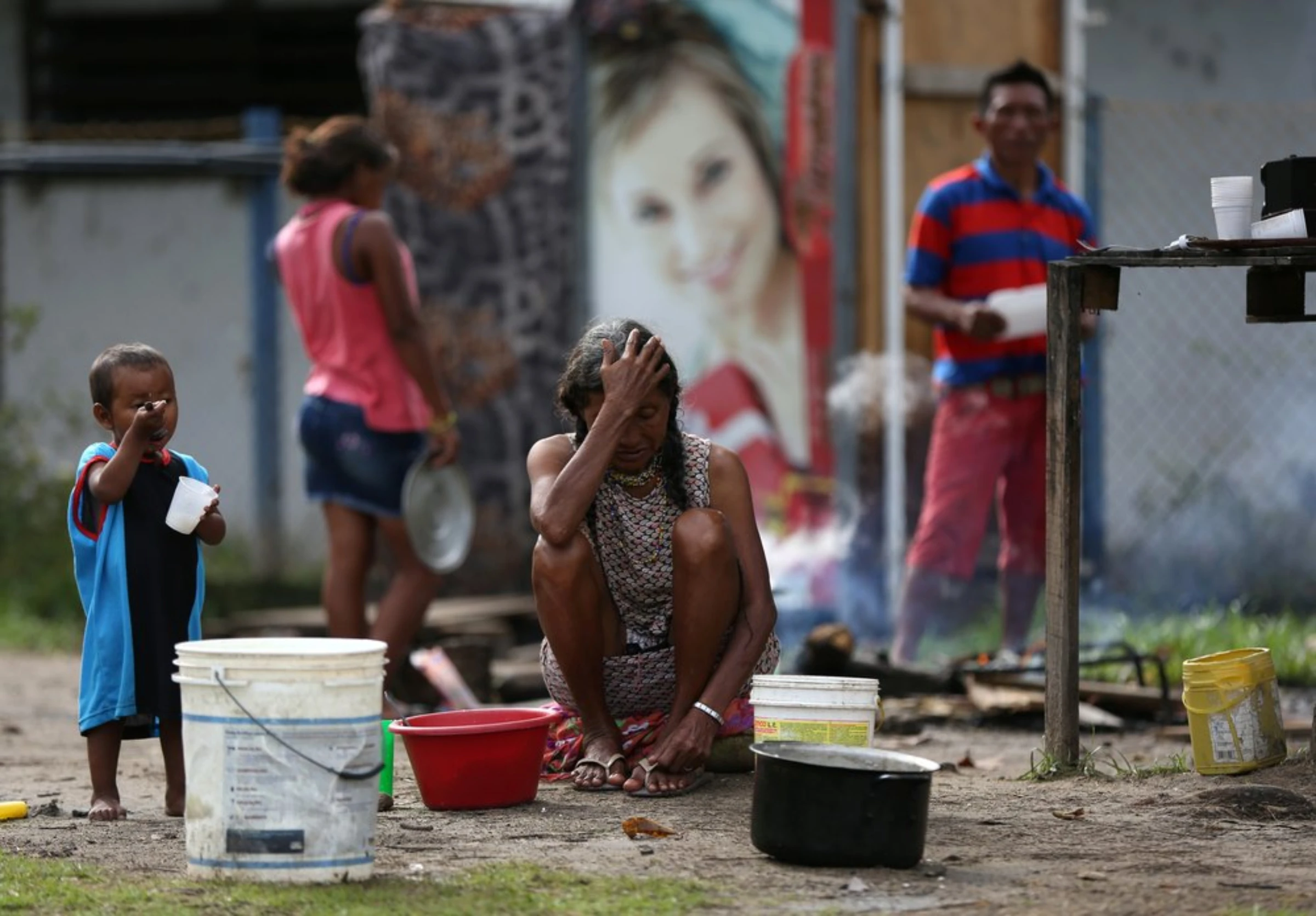 Members from the indigenous Warao people from the Orinoco Delta in eastern Venezuela, are seen near a bus terminal in Manaus, Brazil January 14, 2019