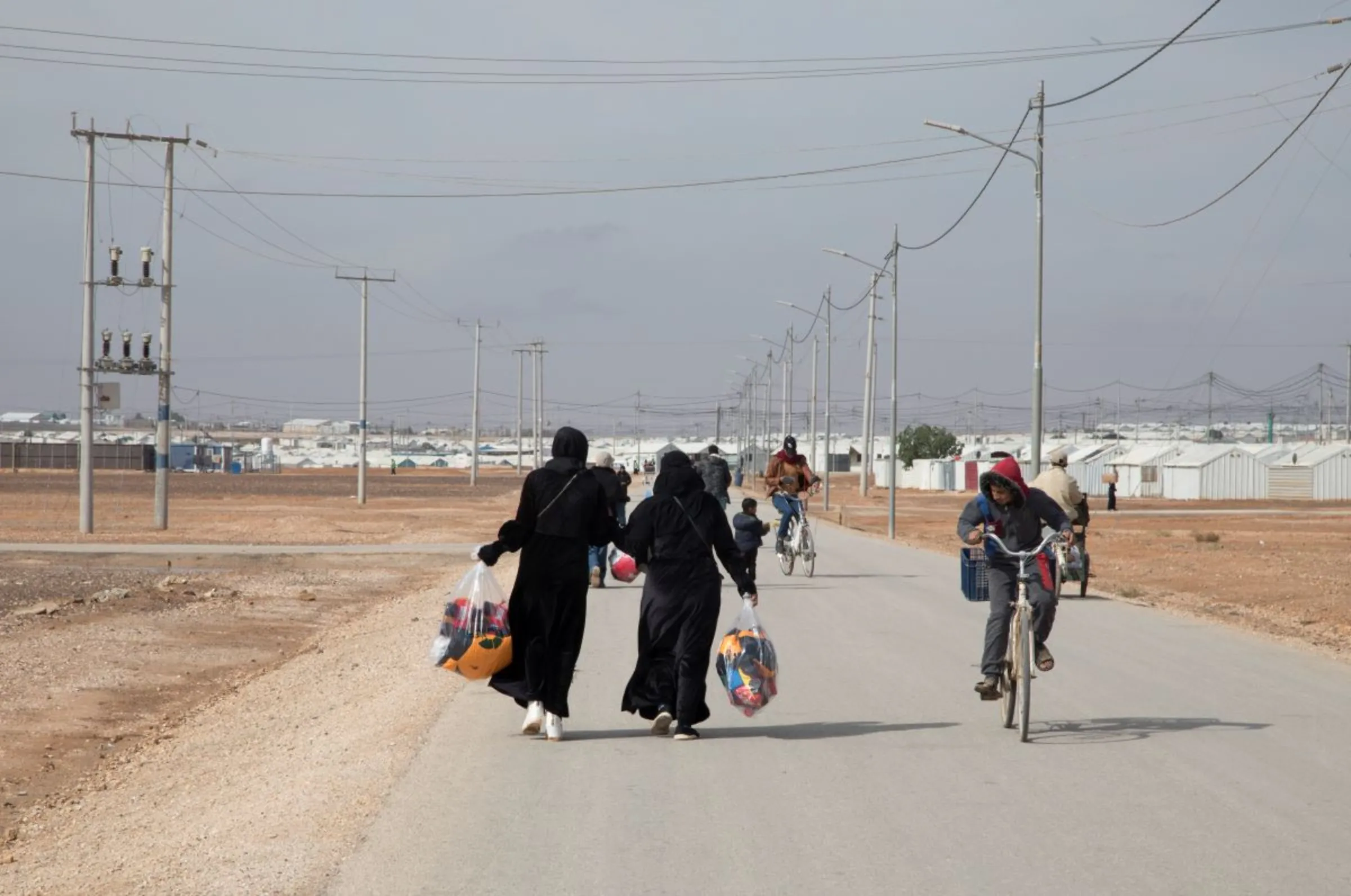 Pedestrians walk on of the roads of Azraq in Jordan. November 27, 2022