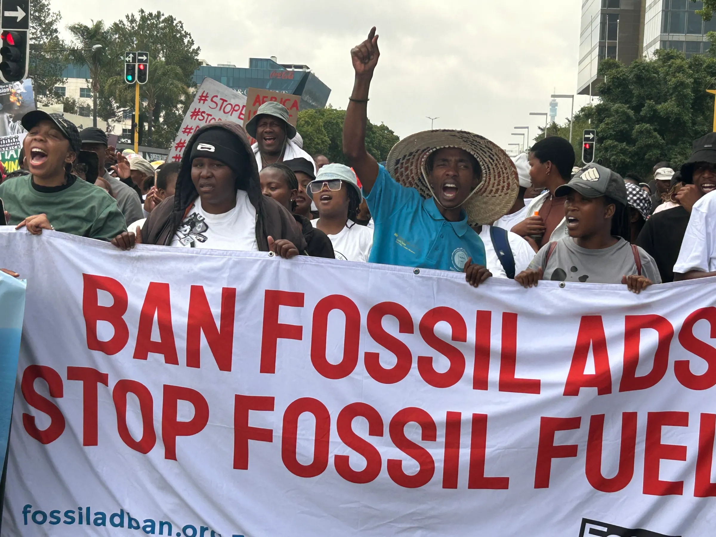 Protesters march to Total Energies offices to demand an end to mining-related human rigths abuses and for Africans to have more of a say over critical minerals in Johannesburg, South Africa. November 20, 2025. Thomson Reuters Foundation/Kim Harrisberg