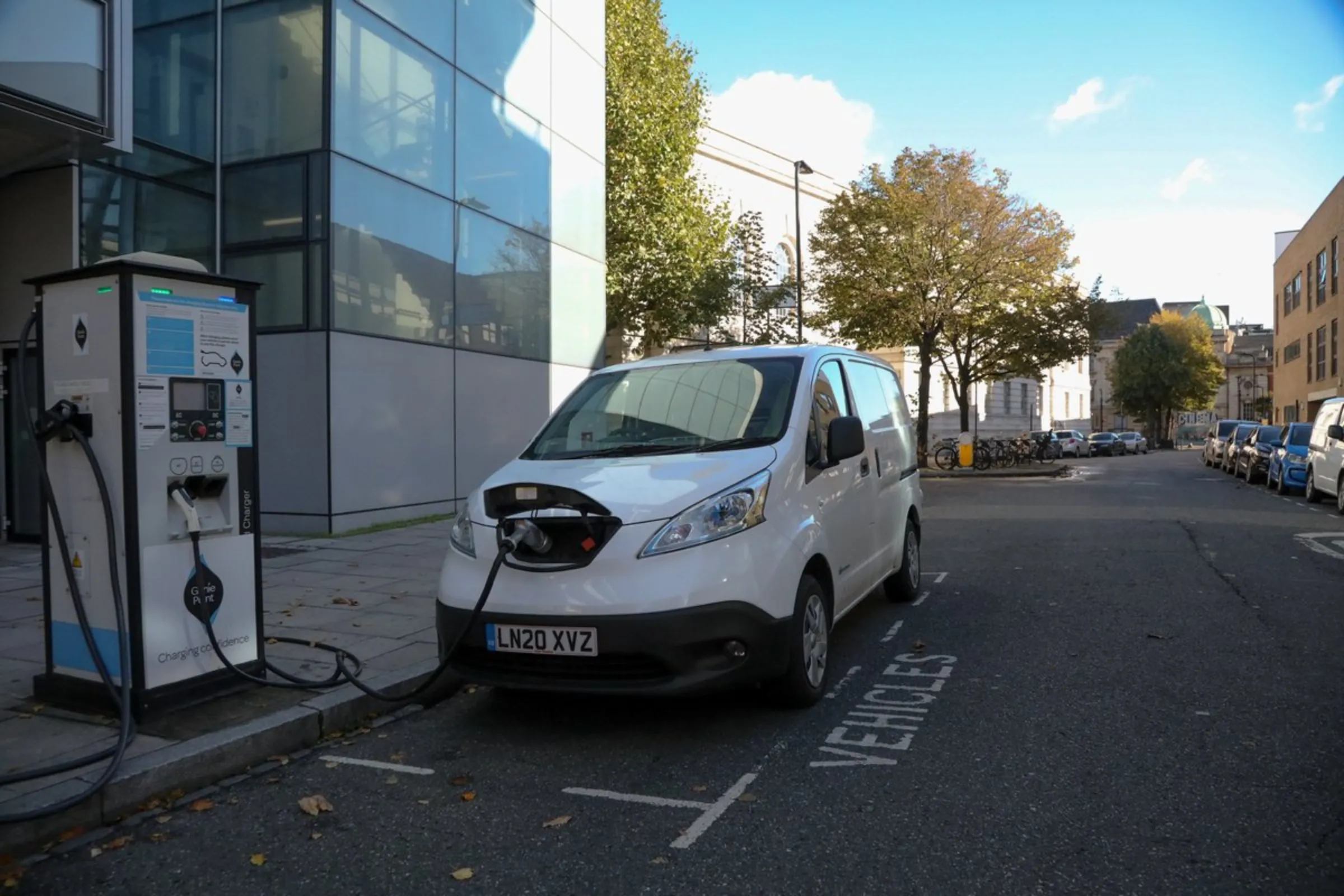 An electric van charges outside Hackney Service Centre in London, England, on October 21, 2021