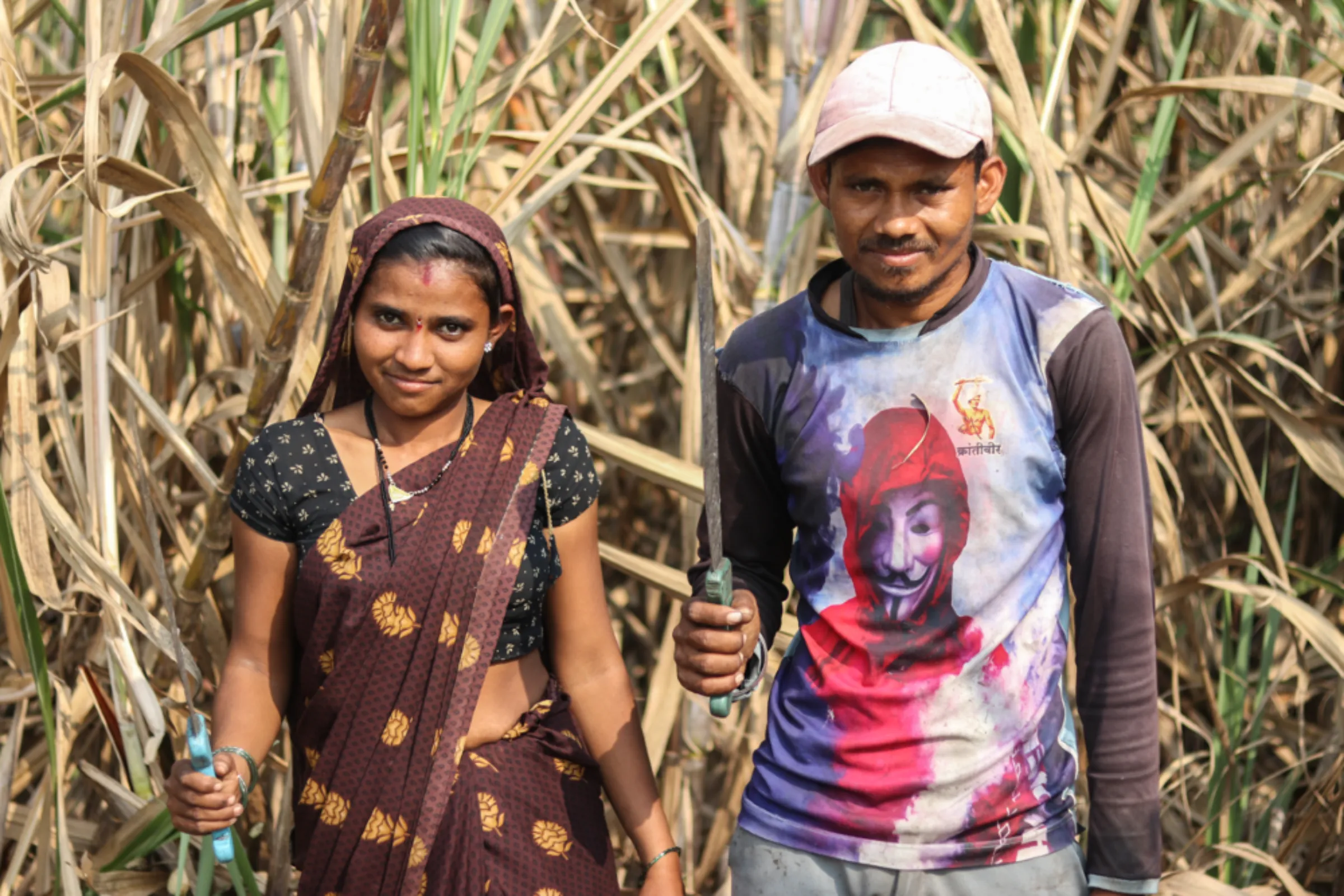Moni Nave (to the left) and Nitin Nave at a sugarcane farm in Maharashtra’s Khochi village which is over 600 kilometres (372 miles) from their village