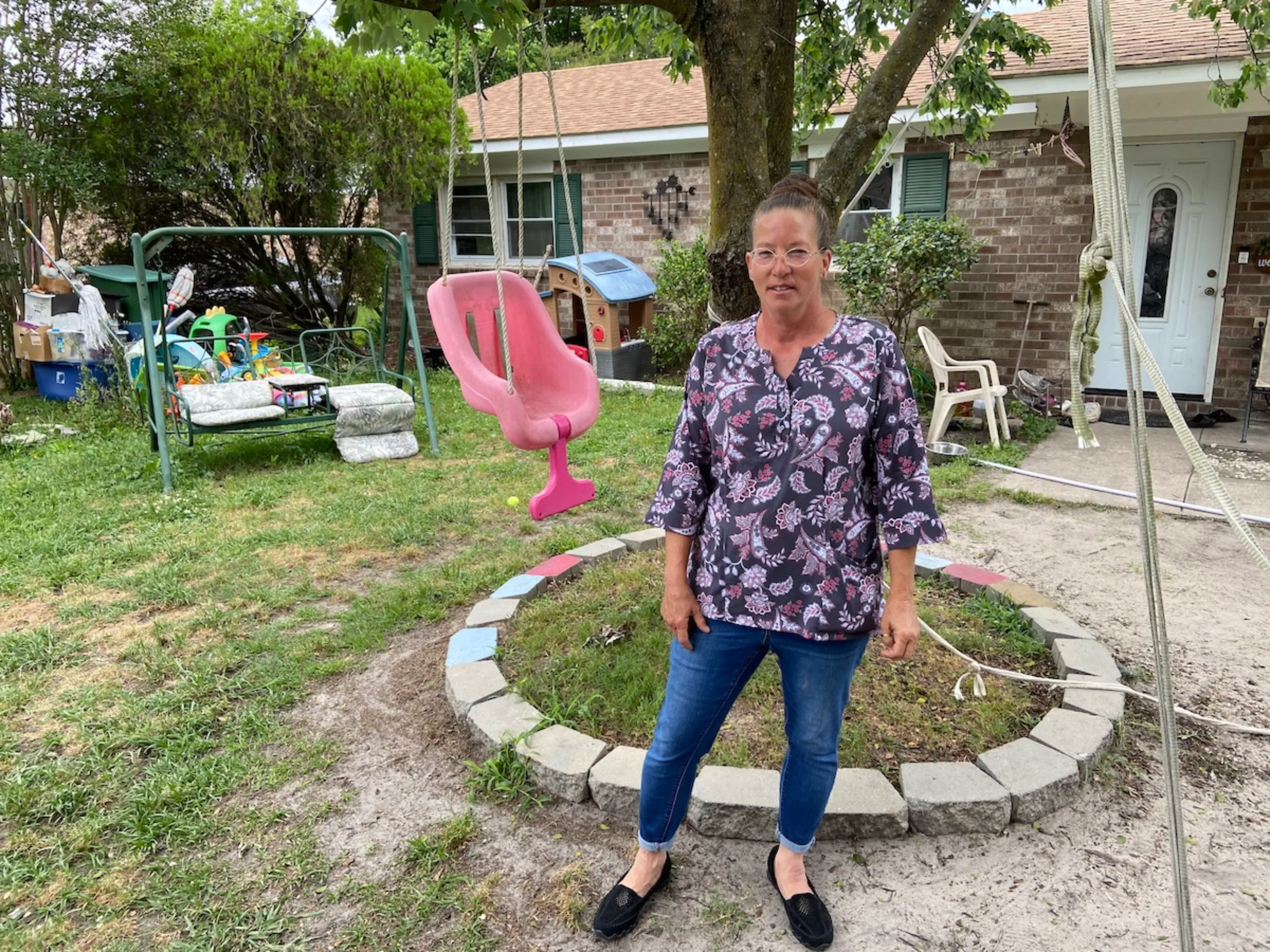 Terri Straka is pictured in front of her home in Socastee, South Carolina, USA on Sunday, May 8, 2022. Thomson Reuters Foundation/David Sherfinski