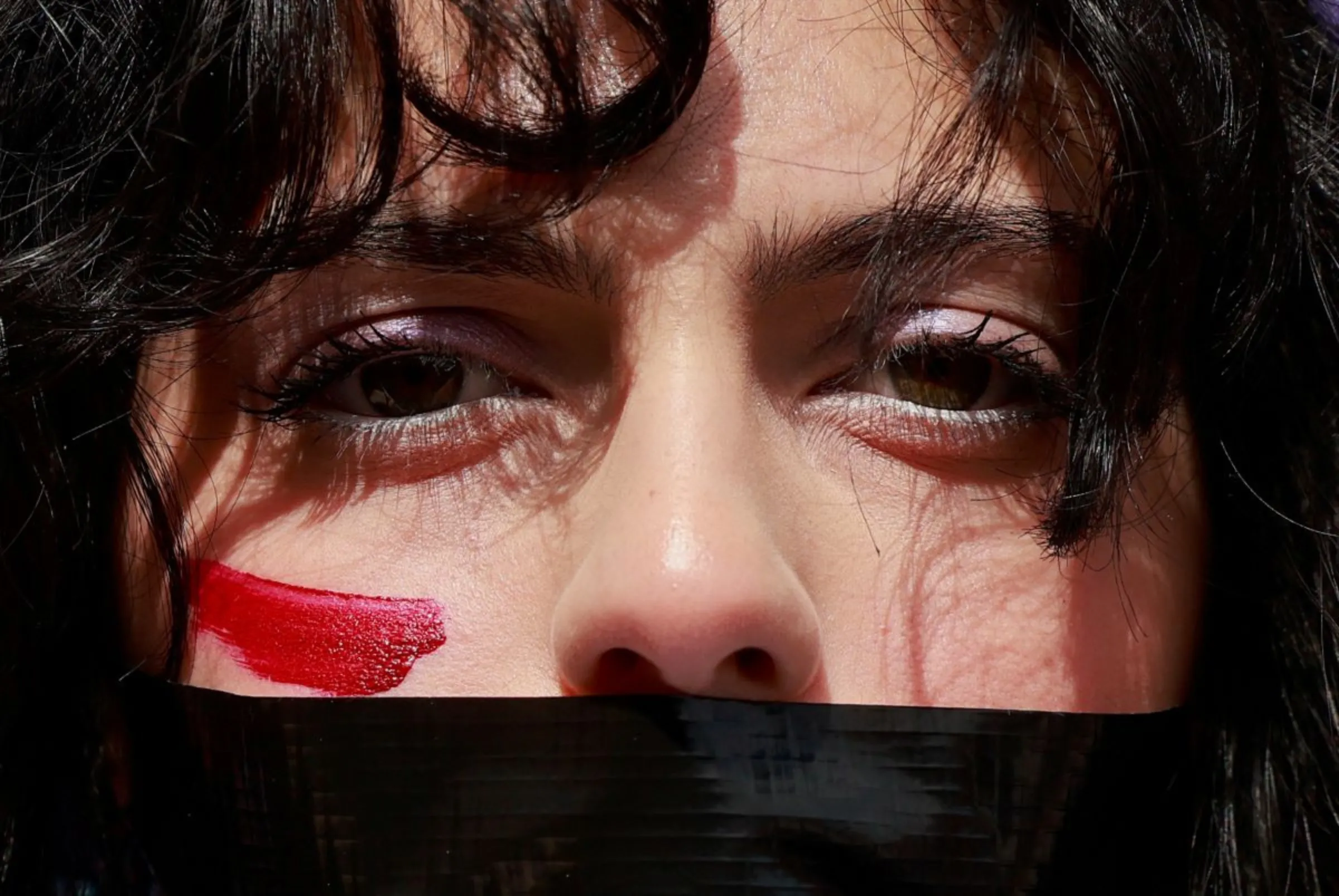 A demonstrator takes part in an International Women's Day rally in Rome, Italy, March 8, 2024. REUTERS/Yara Nardi