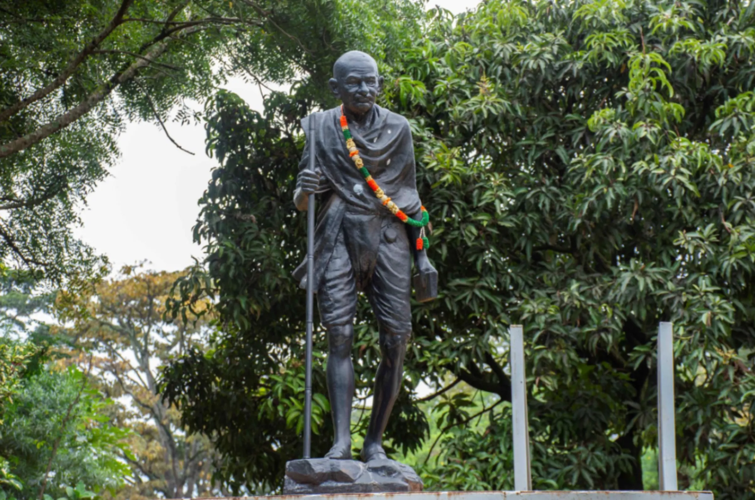 A statue of Mahatma Ghandi, an Indian anti-colonial nationalist, stands outside an Indian Temple in Jinja District, Uganda, October 1, 2022