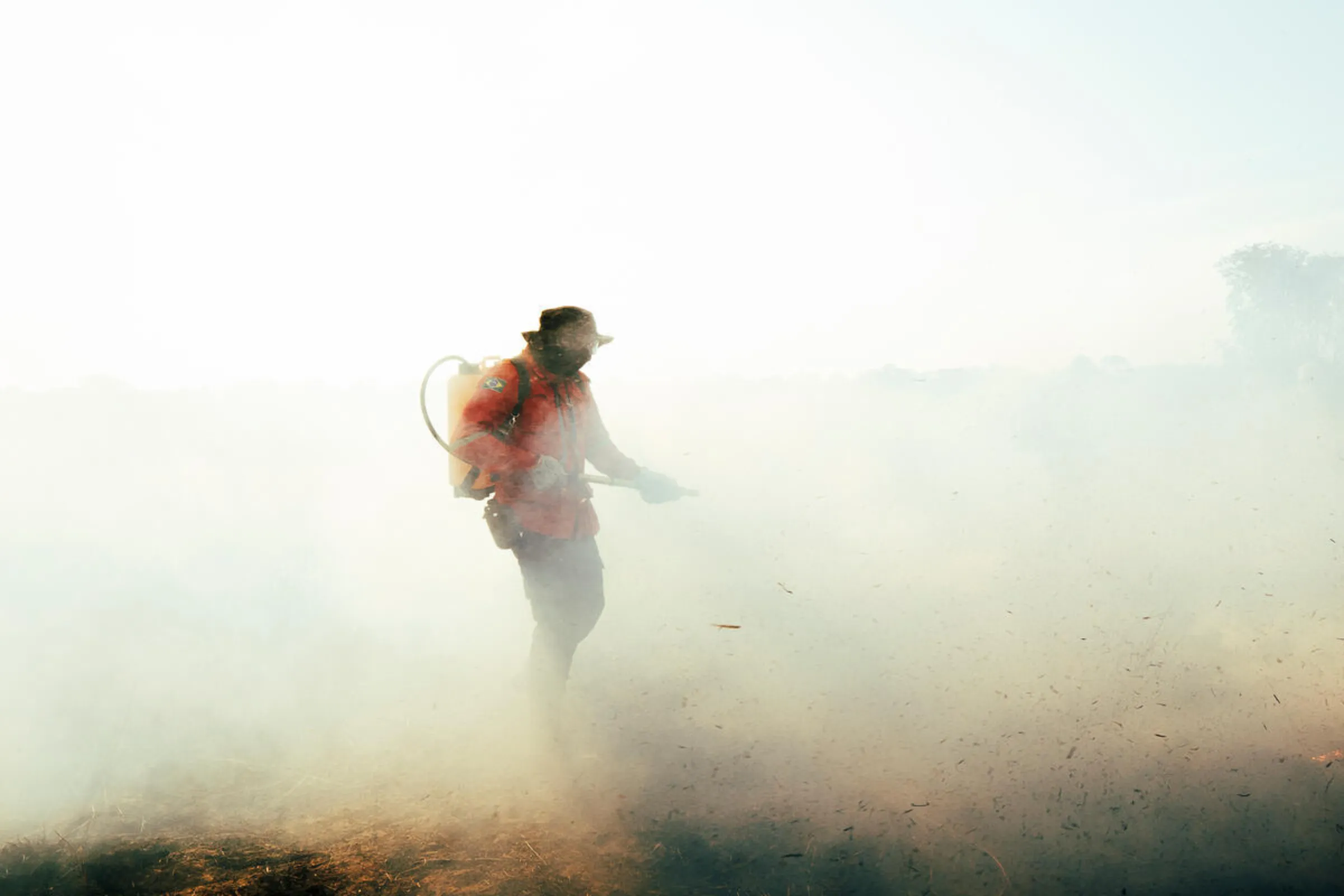 Firefighters from the Bridada de Alter use fire management techniques to protect areas of ecological interest in Alter do Chao, Para State, Brazil. August 1, 2024. Brigada de Alter/Handout via Thomson Reuters Foundation
