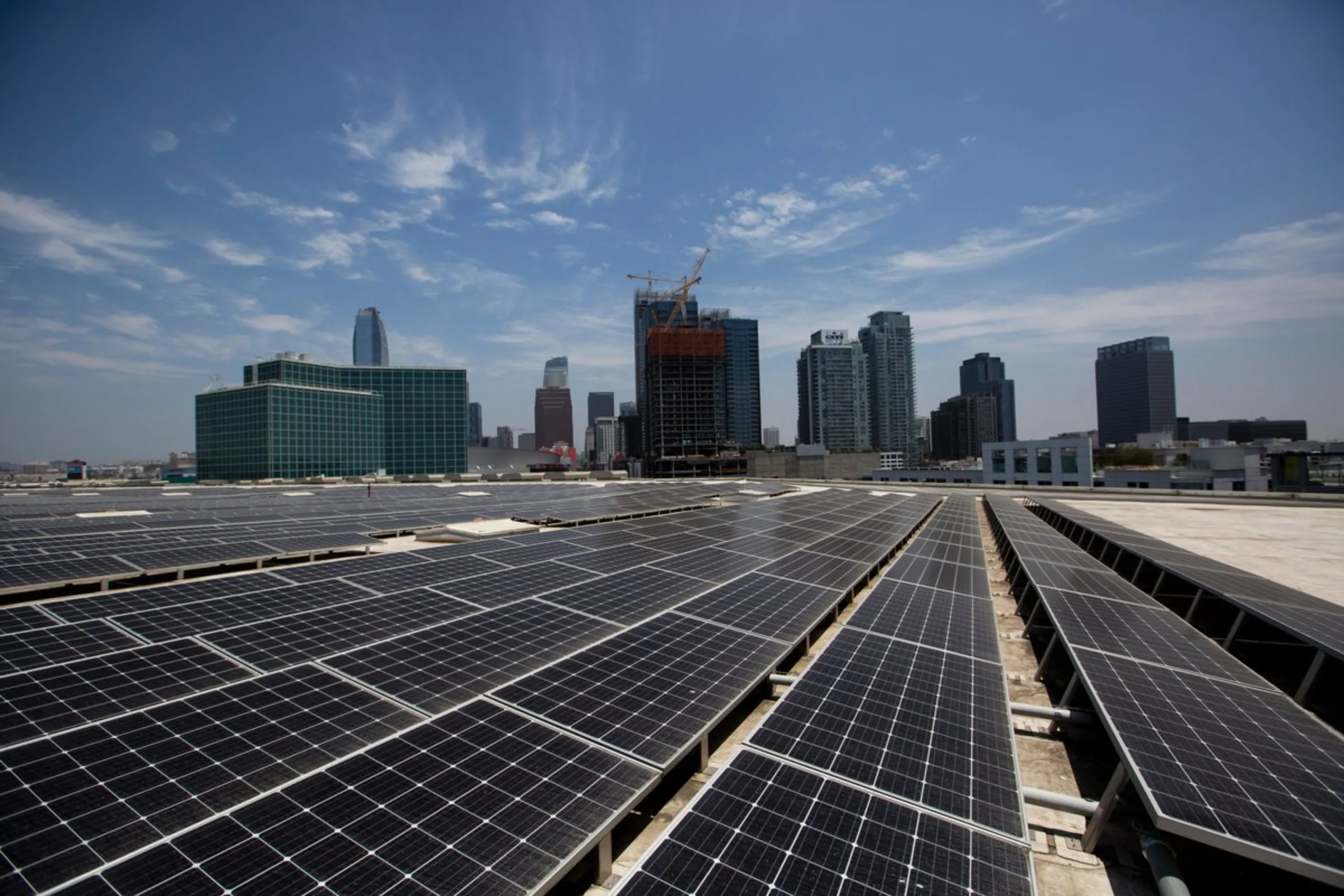 Solar panels cover the rooftop of the Convention Center in downtown Los Angeles, California, May 28, 2021