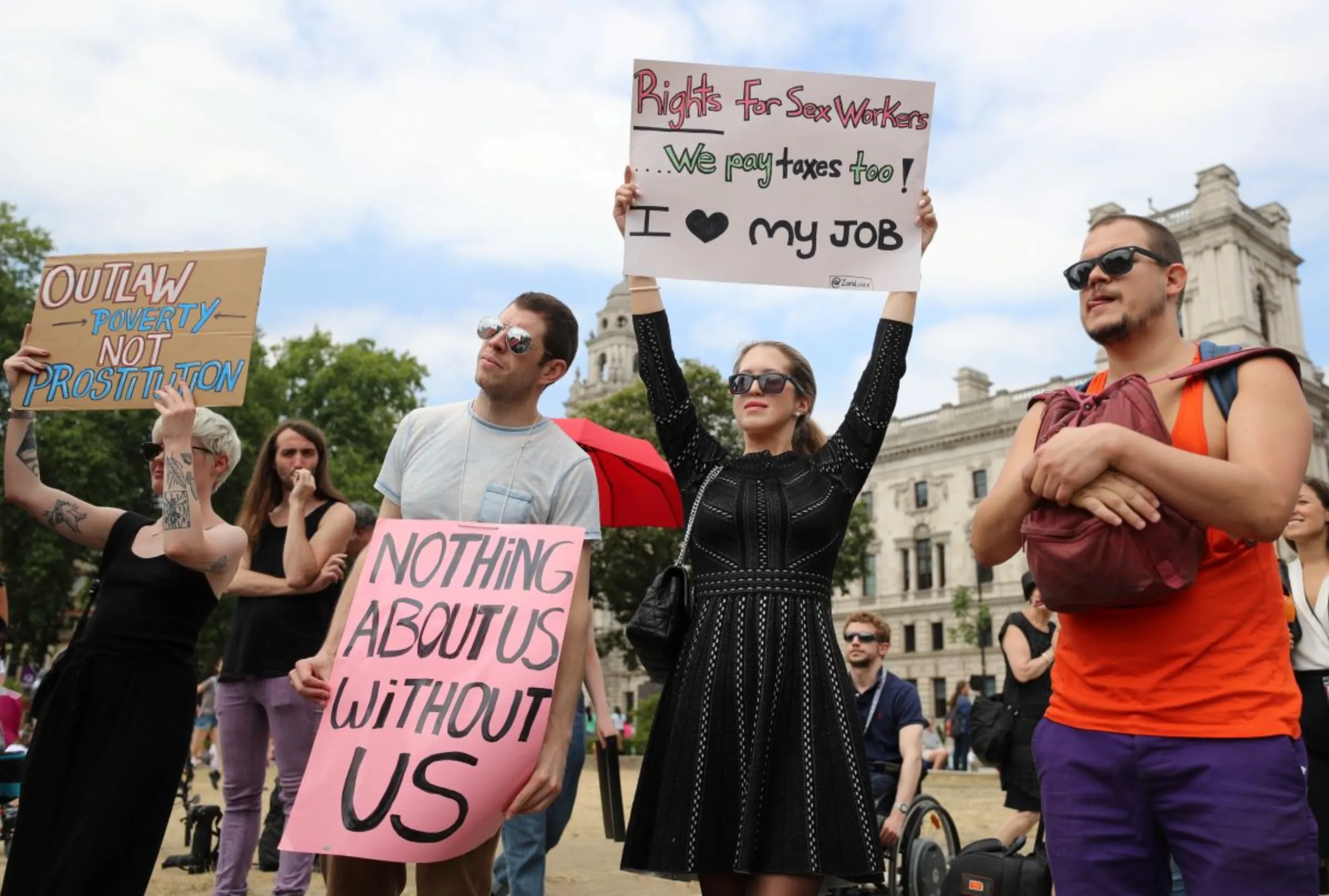 Sex workers demonstrate outside the Houses of Parliament in Westminster, London, Britain, July 4, 2018. REUTERS/Simon Dawson